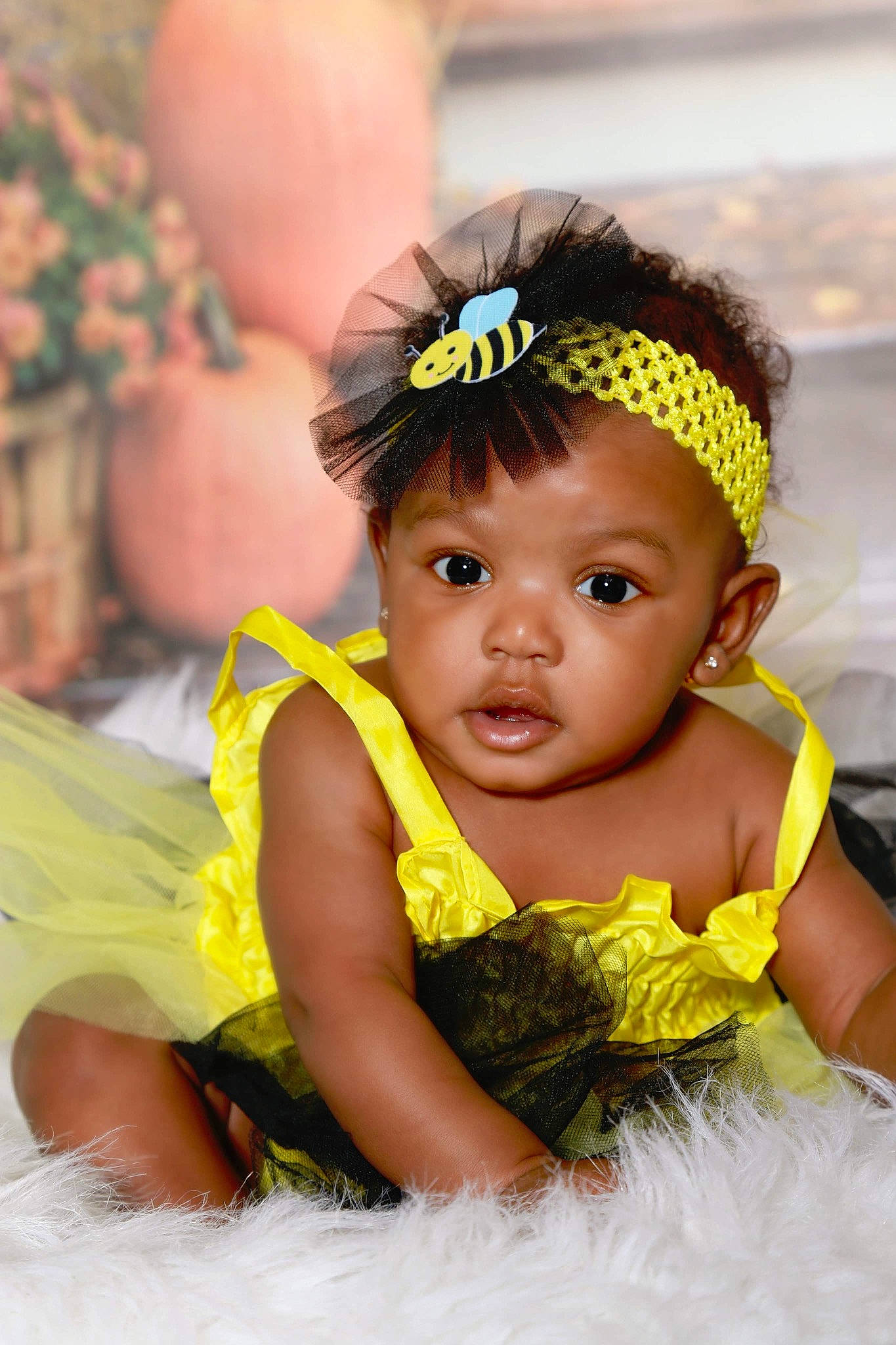 Azari is registered to the contest to win money with this photo: baby, baby_bloomers, baby_toddler_clothing, child, child_model, costume, costume_accessory, fashion_accessory, fun, hair_accessory, happy, headband, headgear, headpiece, person, photography, skin, smile, toddler, yellow