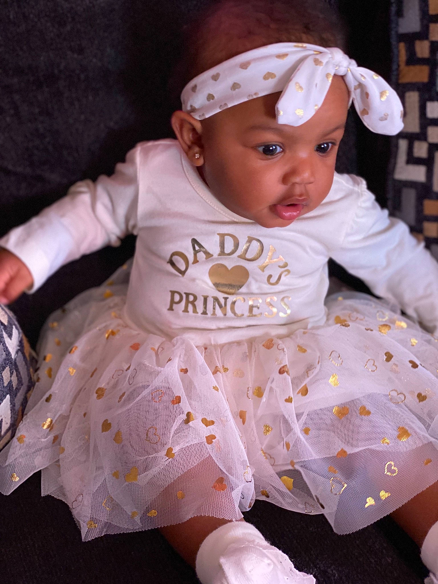 Azari is registered to the contest to win money with this photo: baby, baby_products, baby_toddler_clothing, child, clothing, costume, dress, hair_accessory, headgear, headwear, pattern, person, pink, product, sleeve, toddler, white
