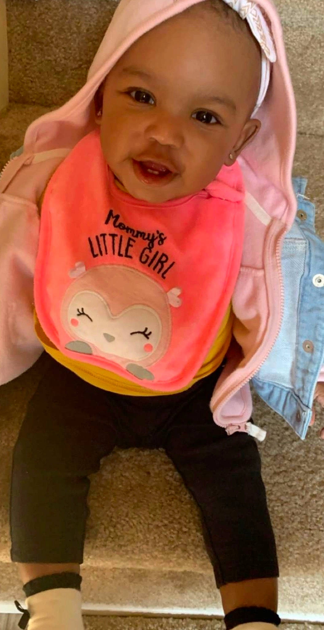 Azari is registered to the contest to win money with this photo: baby, cheek, child, outerwear, person, pink, play, smile, toddler