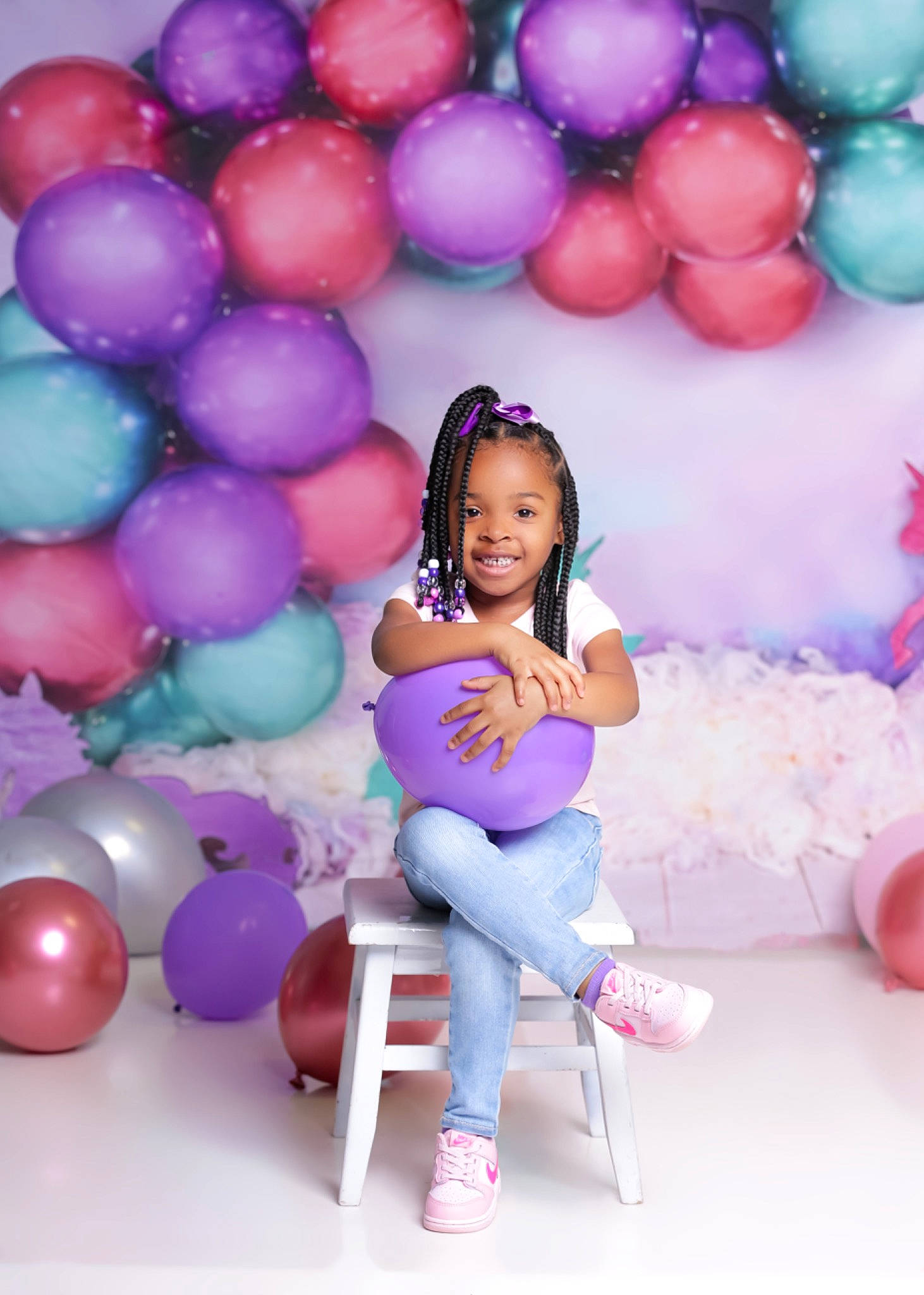 Sariyah is registered to the contest to win money with this photo: balloon, child, event, flash_photography, fun, happy, joy, leisure, magenta, party, party_supply, person, pink, purple, sandal, sitting, smile, snapshot, thigh, toy