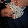 baby, infant, striped_clothing, hands, person, lying_down, bed, blue, skin, face, newborn, child, toddler, comfort, resting, cute, sleepwear, care, soft, family