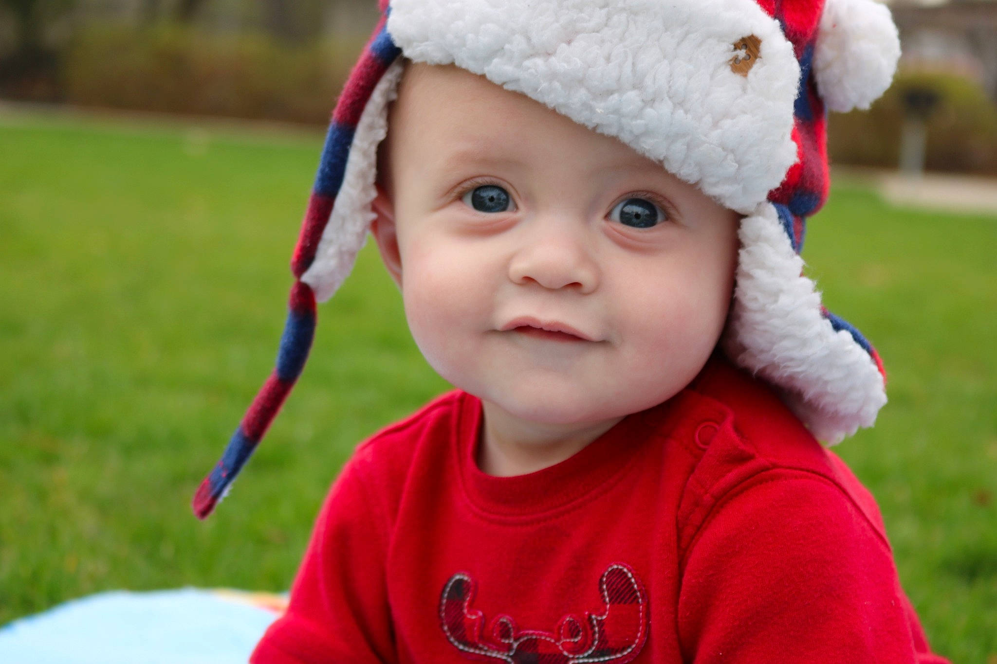 Gideon joined the competition — help win amazing prizes! baby, bonnet, cheek, child, christmas, eye, face, facial_expression, fun, happy, head, headgear, knit_cap, lip, person, photography, portrait_photography, red, skin, smile