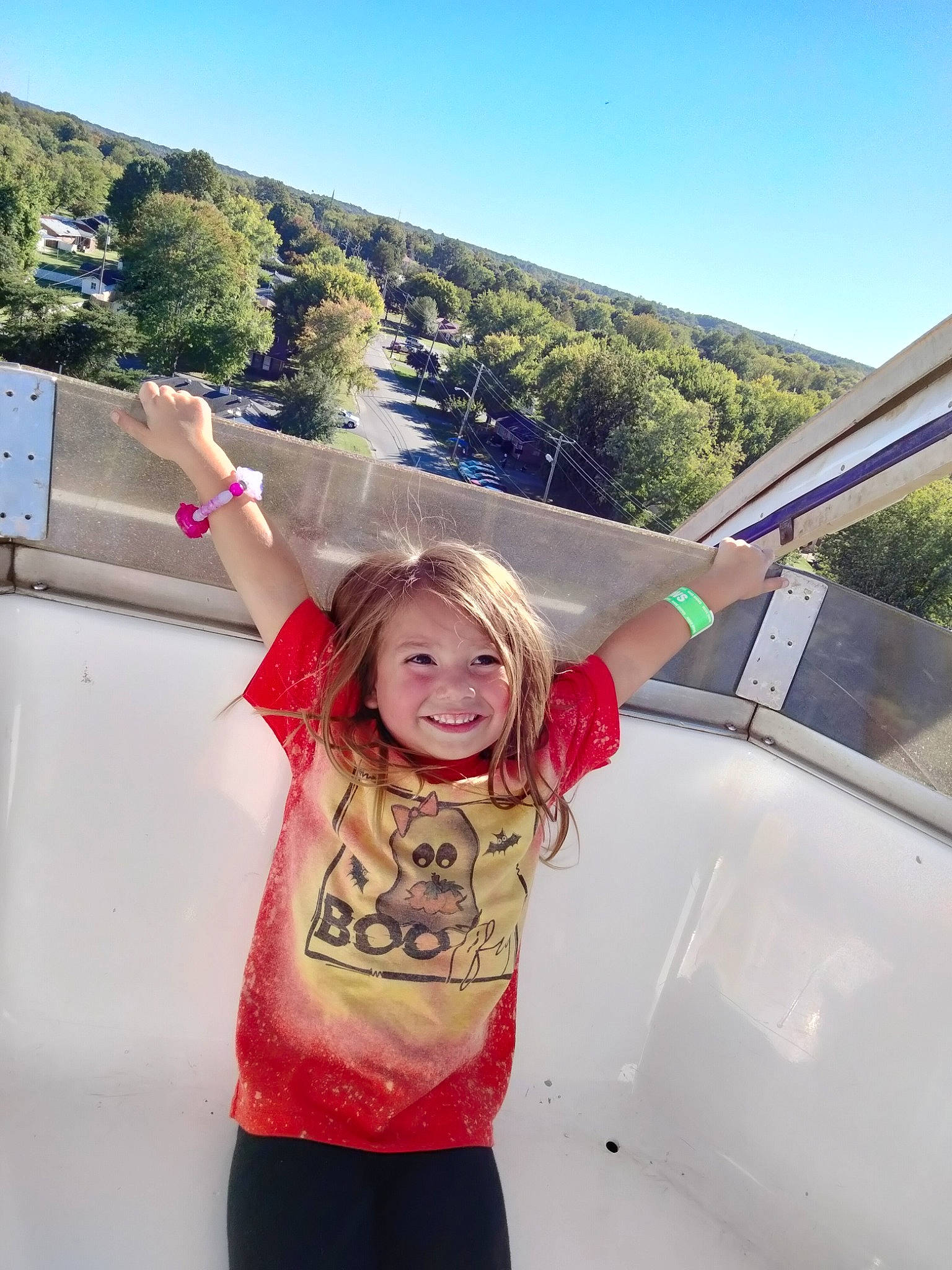 Josie joined the competition — help win amazing prizes! automotive_exterior, child, fun, grass, happy, joy, landscape, leisure, luxury_vehicle, motor_vehicle, person, recreation, shoulder, sky, smile, summer, t_shirt, toddler, travel, tree