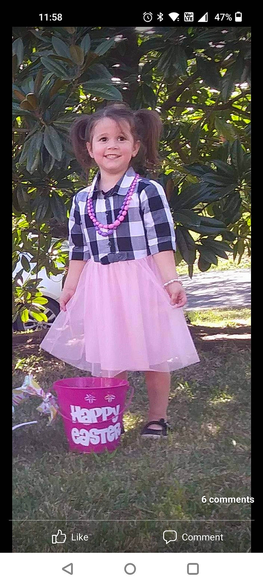 Juliann is registered to the contest to win money with this photo: baby_toddler_clothing, beauty, day_dress, electric_blue, fashion_accessory, fashion_design, formal_wear, grass, happy, joy, magenta, one_piece_garment, pattern, person, pink, plaid, purple, sleeve, smile, tartan