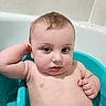 baby, infant, child, bath, bathtub, bathroom, bath_seat, turquoise, sitting, portrait, face, eyes, hair, skin, arm, hand, bare_chest, indoor, tiles, close_up
