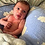 Jasper joined the competition — help win amazing prizes! baby, infant, blanket, pillow, cloud_pattern, bedding, bed, sleeping_area, soft_texture, child, newborn, cute, skin, resting, indoors, comfort, lying_down, head, face, expression