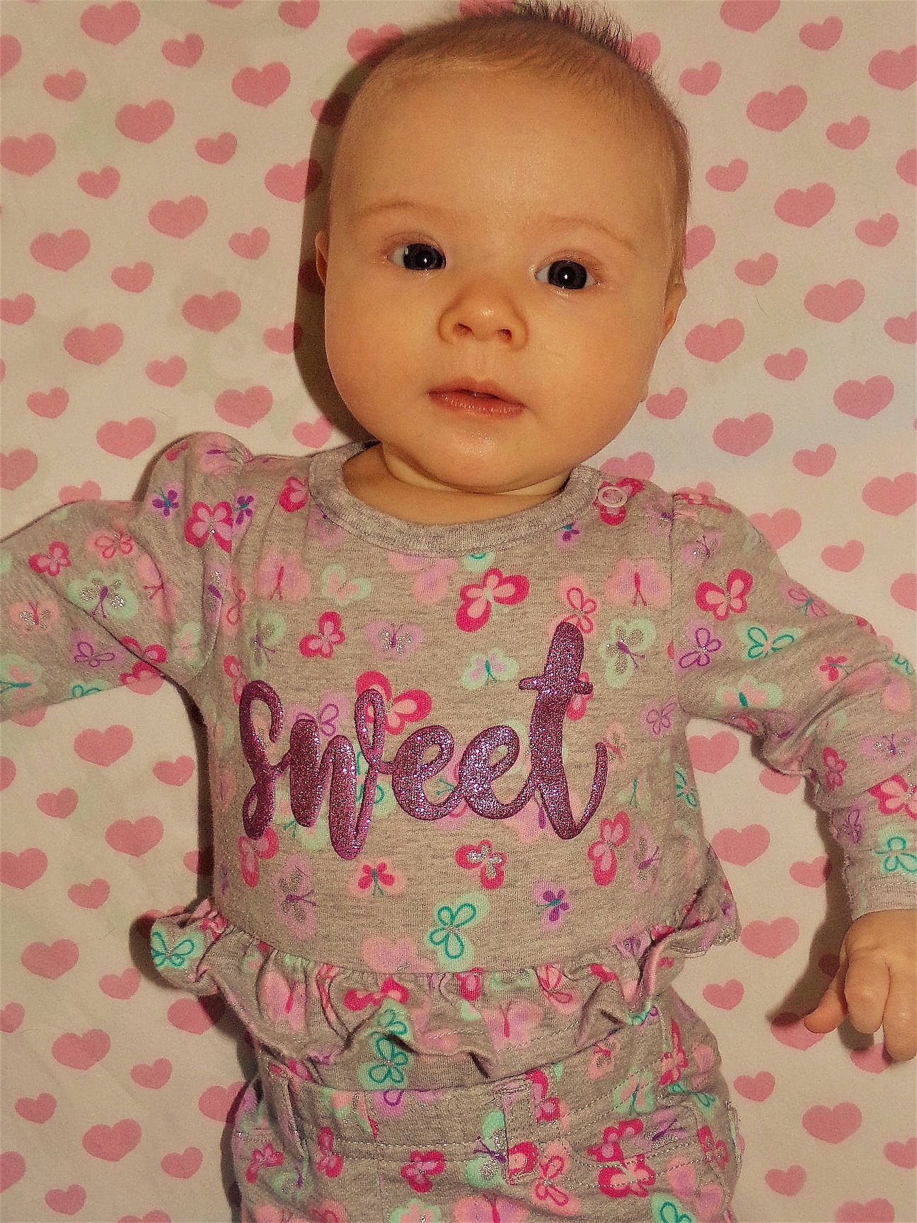 Azlynn joined the competition — help win amazing prizes! baby, baby_products, baby_toddler_clothing, cheek, child, head, pattern, person, pink, product, skin, sleeve, toddler