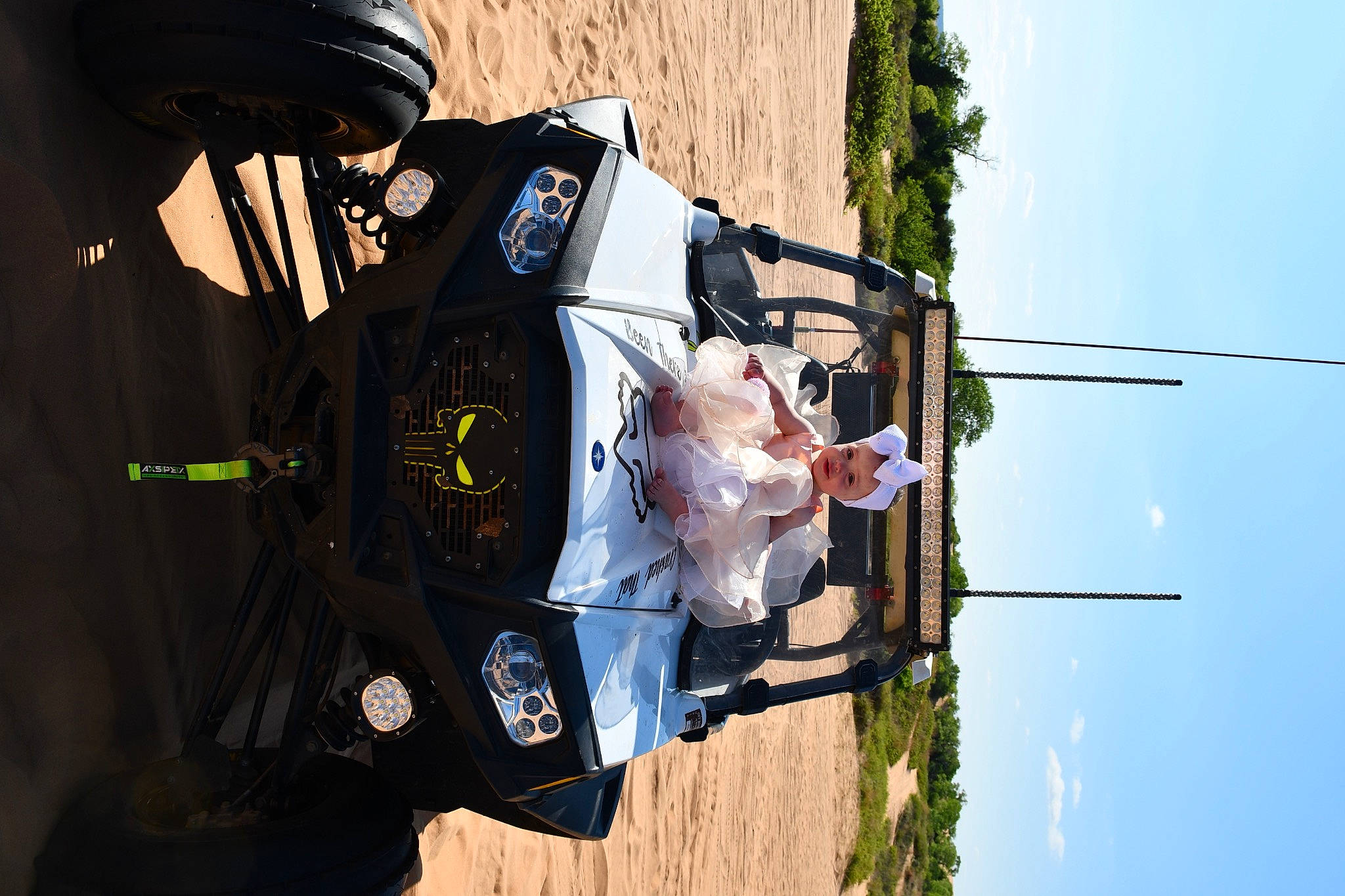 Braylea is registered to the contest to win money with this photo: adventure, backpack, bag, electricity, hat, headwear, luggage_and_bags, person, personal_protective_equipment, recreation, rope, sky, toddler, tree, wire