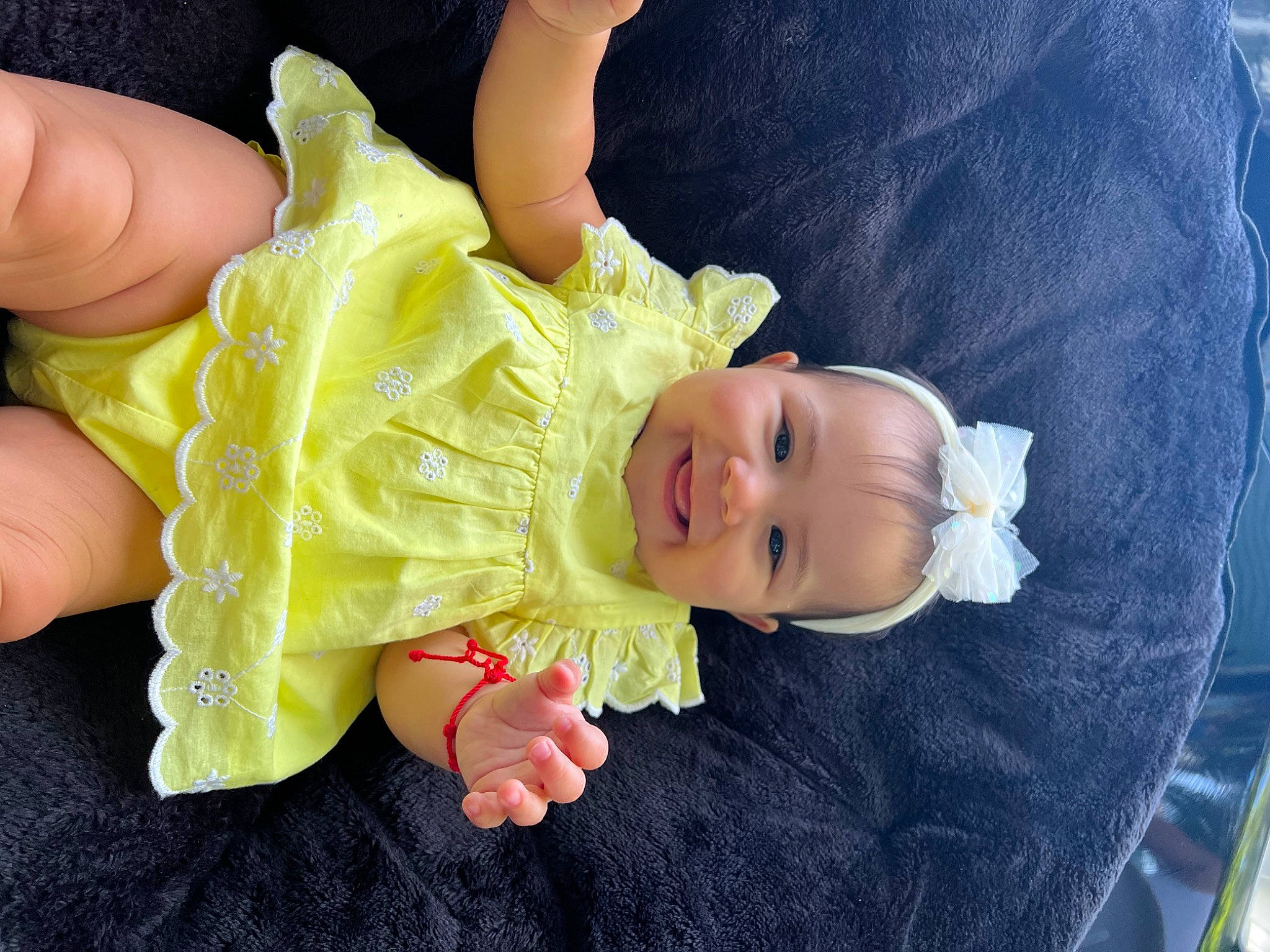 Ariana is registered to the contest to win money with this photo: baby, baby_products, baby_toddler_clothing, cheek, child, comfort, finger, gesture, hand, happy, hat, holding_hands, joy, leg, nail, person, product, sitting, skin, thumb