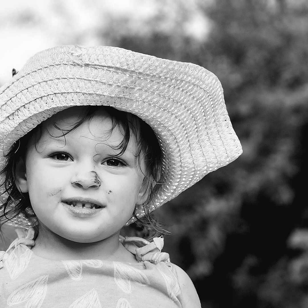 Cyhpress is registered to the contest to win money with this photo: baby, bodypart, bonnet, cap, clothing, cowboyhat, face, finger, hand, happy, hat, head, mouth, person, photography, portrait, smile, sunhat