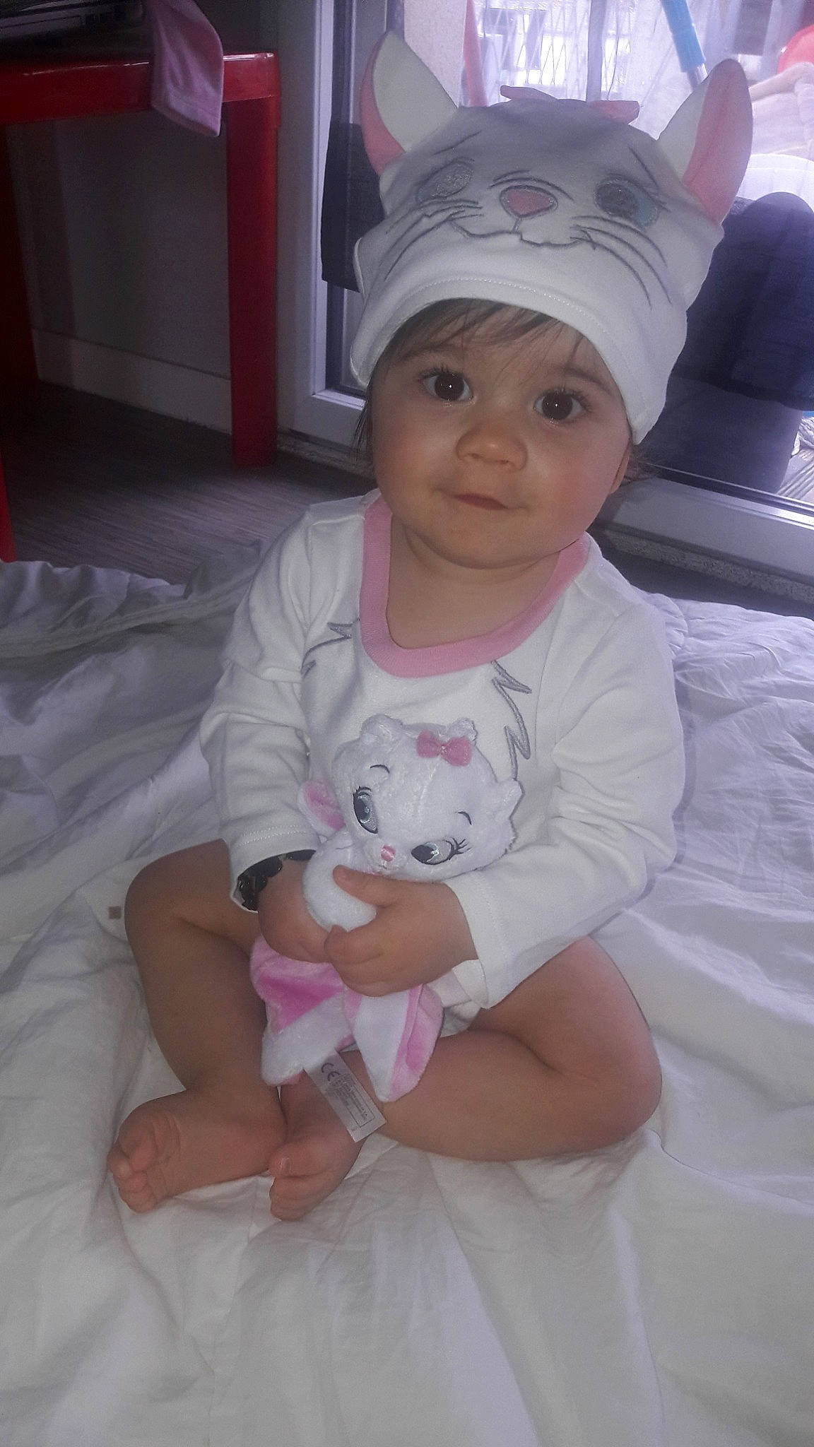 Leyana a rejoint le concours — aidez-le/la à gagner de superbes lots ! baby, baby_toddler_clothing, child, headgear, headwear, person, pink, skin, smile, toddler