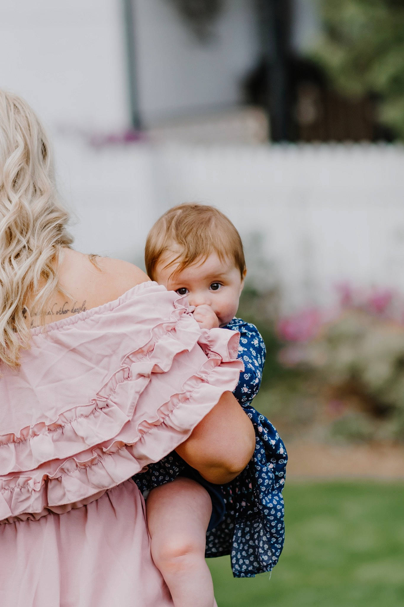 Savannah is registered to the contest to win money with this photo: baby, ceremony, child, dress, event, flash_photography, formal_wear, gesture, grass, hand, happy, hug, love, pattern, people_in_nature, person, photo_shoot, plant, portrait_photography, sitting