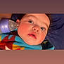 Aleah joined the competition — help win amazing prizes! baby, child, face, rosy_cheeks, blue_eyes, blanket, bottle, purple, curious, close_up, indoors, person, young, cute, infant, looking_up, soft_light, warm_colors, sleepwear, expression