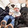 baby, infant, sleeping, beanie, hat, jeans, boots, belt_buckle, blanket, couch, furniture, clothing, cute, child, resting, portrait, indoor, soft, cozy, relaxing