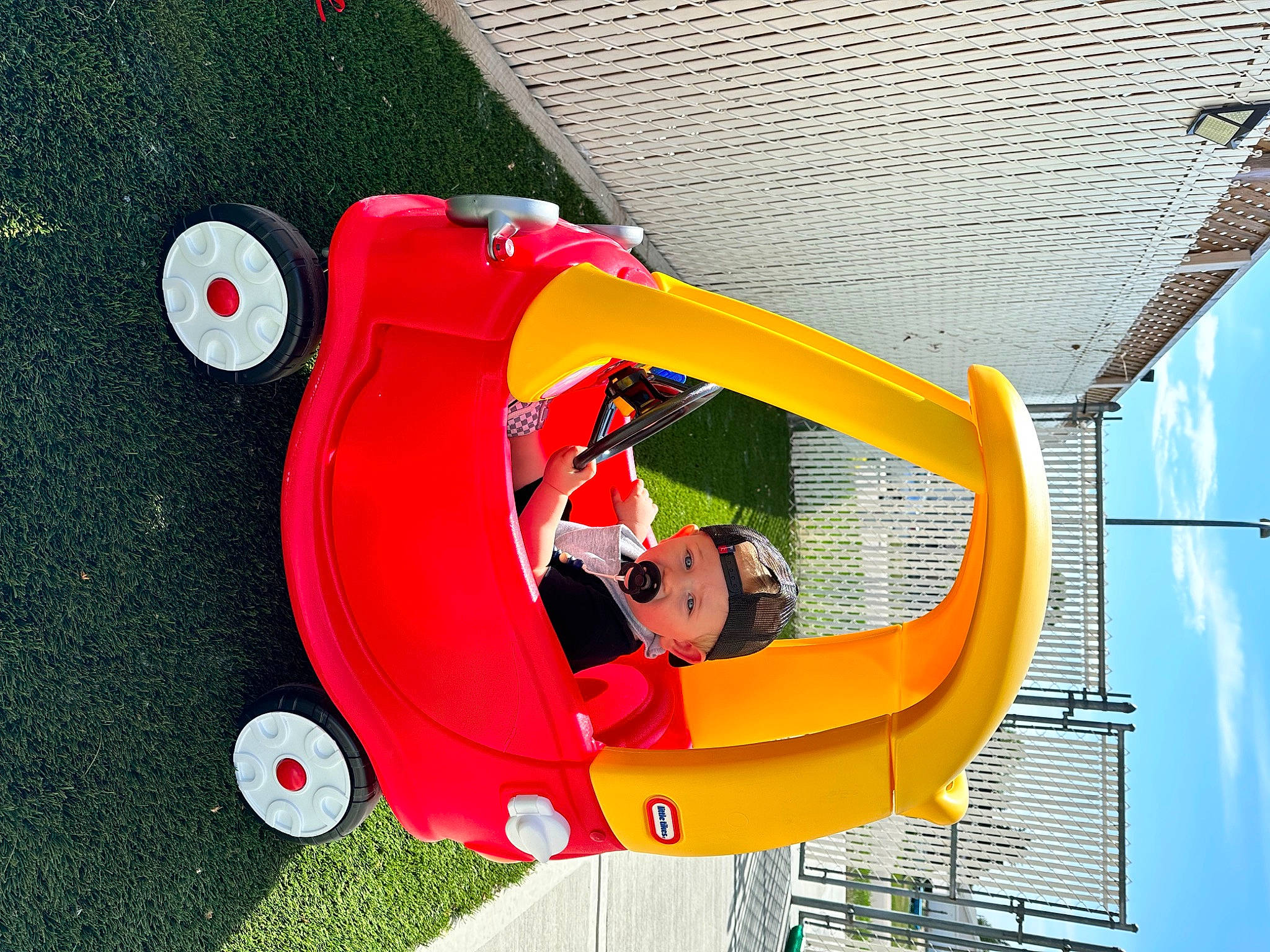 Braxtyn joined the competition — help win amazing prizes! auto_part, automotive_design, automotive_exterior, automotive_wheel_system, bumper, carmine, chute, circle, fun, grass, headwear, inflatable, leisure, motor_vehicle, outdoor_play_equipment, person, play, recreation, swimming_pool, toy