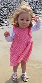 Manon a rejoint le concours — aidez-le/la à gagner de superbes lots ! baby_toddler_clothing, child, day_dress, fashion_accessory, fashion_design, fun, gesture, happy, human_leg, magenta, pattern, people_in_nature, person, pink, sleeve, smile, thigh, thumb, toddler, waist