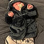 Micah is registered to the contest to win money with this photo: baby, infant, pacifier, sleeping, blanket, fur_coat, hood, cartoon_pants, mickey_mouse, plush, cute, cozy, child, soft_texture, clothing, resting, indoors, adorable, warm, comfort