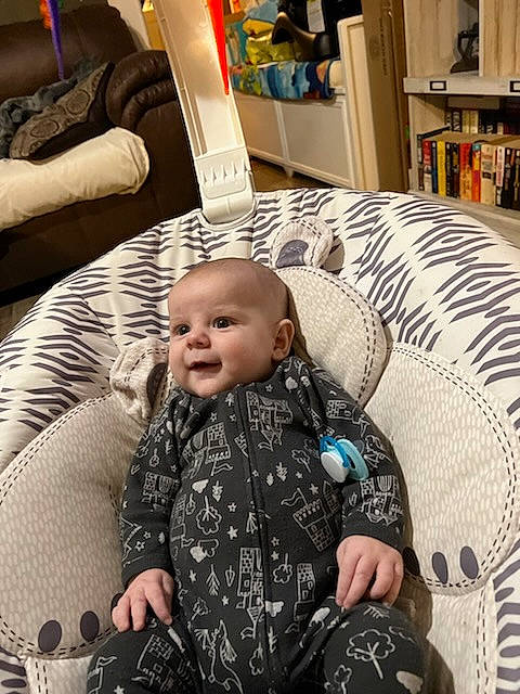 Matthew joined the competition — help win amazing prizes! baby, baby_toddler_clothing, bookcase, car_seat, cheek, child, comfort, flooring, fun, hairstyle, living_room, people, person, picture_frame, product, room, shelf, shelving, sitting, toddler