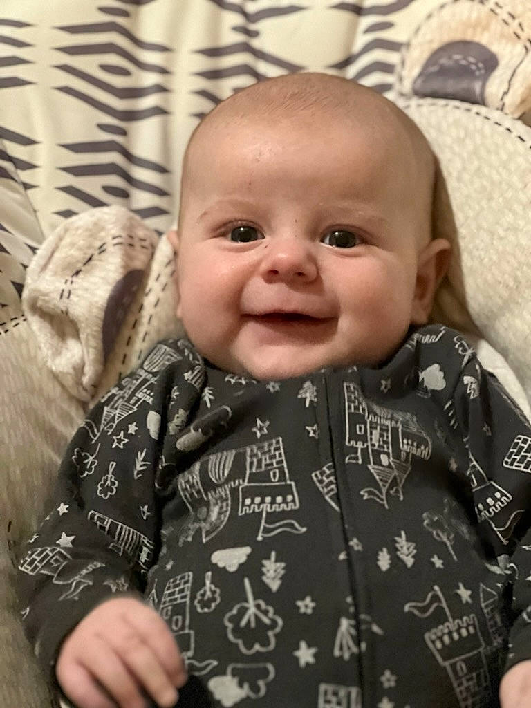 Matthew is registered to the contest to win money with this photo: baby, baby_toddler_clothing, cheek, chin, eye, eyebrow, face, facial_expression, gesture, hairstyle, head, human, iris, joy, lip, mouth, nose, person, product, skin