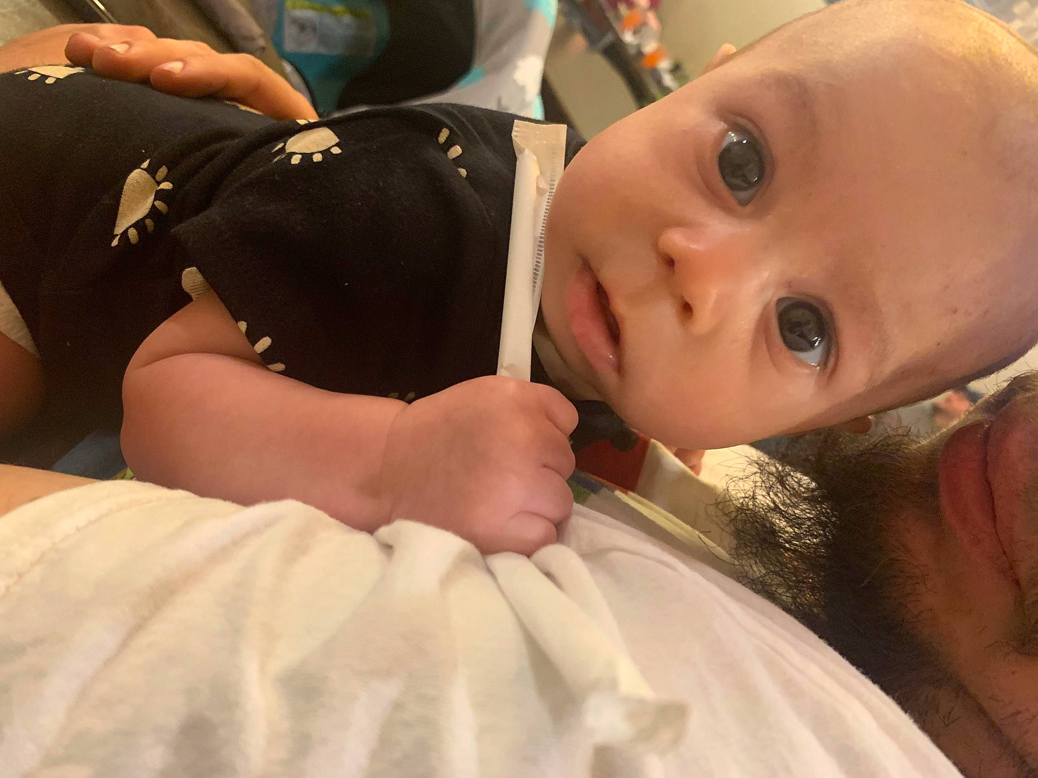 Link is registered to the contest to win money with this photo: baby, baby_toddler_clothing, cheek, child, comfort, ear, elbow, eye, eyelash, finger, gesture, hand, happy, human_body, neck, nose, person, skin, sleeve, smile