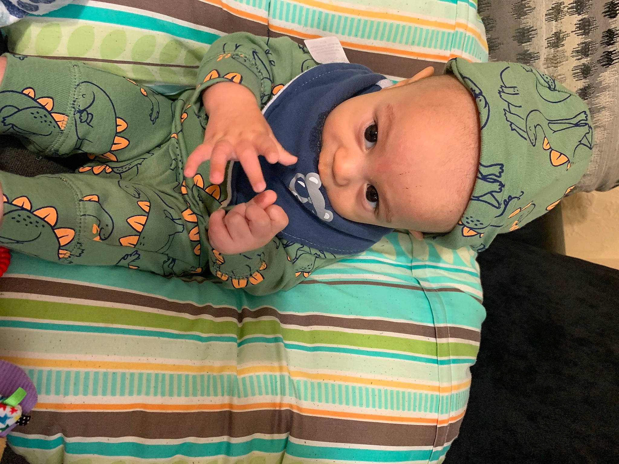 Link is registered to the contest to win money with this photo: baby, baby_products, baby_toddler_clothing, cap, cheek, child, comfort, fashion_accessory, fun, grass, hat, linens, pattern, person, play, room, sitting, skin, sleeve, textile