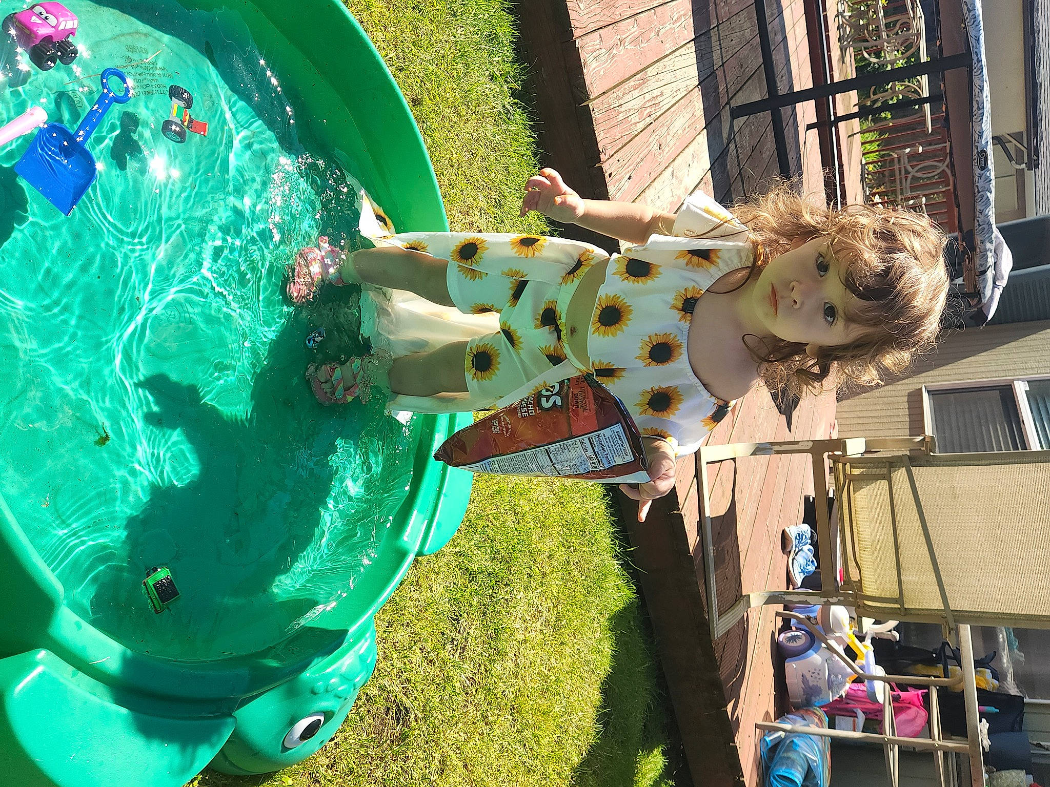 Addelyn joined the competition — help win amazing prizes! child, chute, circle, city, fun, grass, green, landscape, leisure, outdoor_play_equipment, person, plant, play, playground, recreation, toddler, vacation, visual_arts, water, window