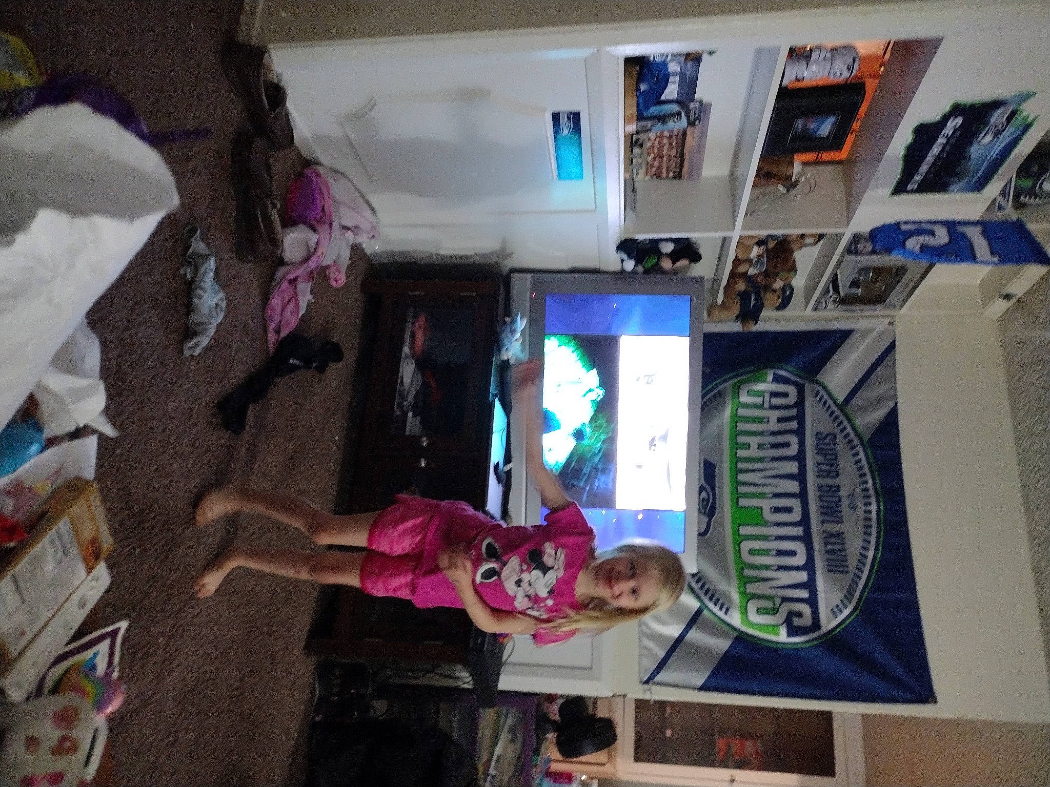 Lilyanna joined the competition — help win amazing prizes! building, child, display_device, fun, house, joy, machine, magenta, person, purple, room, shelving, t_shirt, toddler, visual_arts