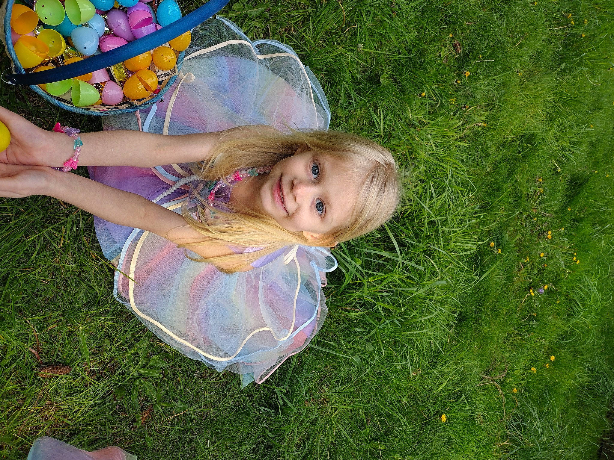 Lilyanna is registered to the contest to win money with this photo: balloon, blond, child, fun, grass, grass_family, grassland, happy, human_leg, joy, lawn, leisure, meadow, people_in_nature, person, plant, play, recreation, sitting, smile