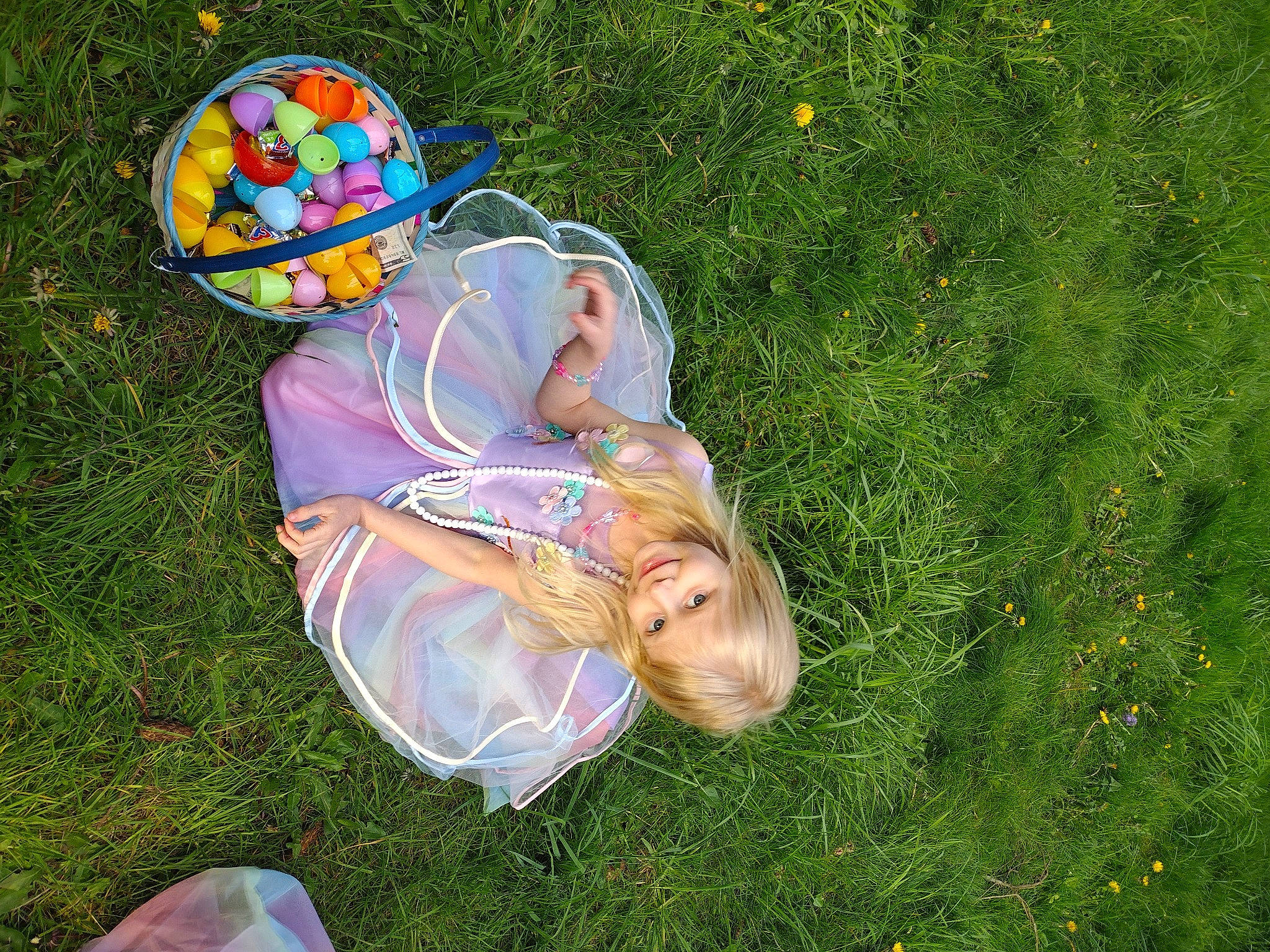 Lilyanna is registered to the contest to win money with this photo: child, event, foot, fun, grass, grass_family, grassland, groundcover, happy, hat, joy, lawn, leisure, meadow, people_in_nature, person, plant, play, recreation, toddler