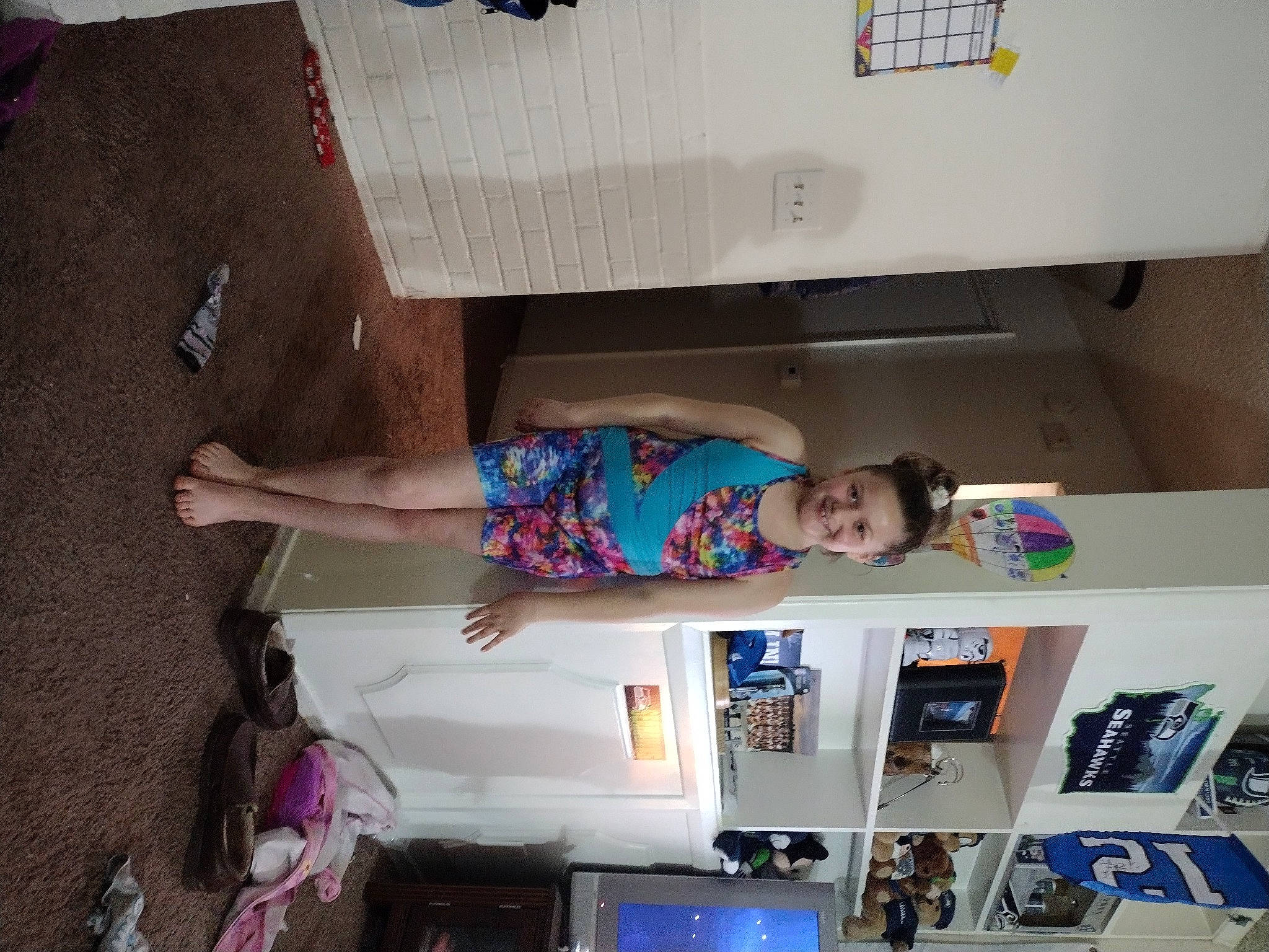 Mackenzie joined the competition — help win amazing prizes! child, display_device, flooring, fun, home_appliance, joy, kitchen_appliance, machine, person, room, shelf, shelving, smile, t_shirt, television, television_set