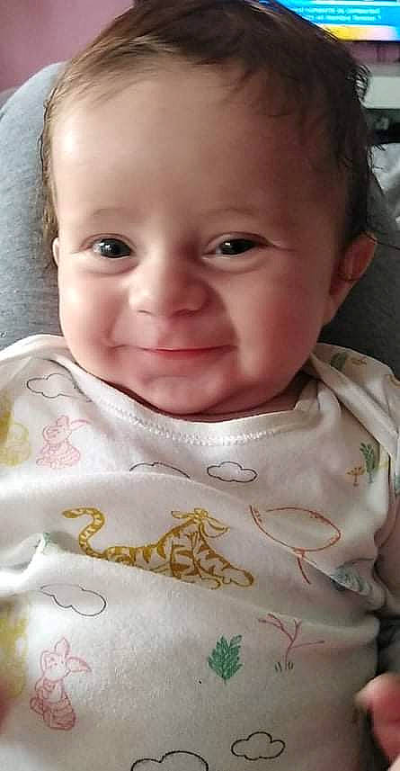 Matteis participe au concours pour gagner de l'argent avec cette photo : baby, baby_toddler_clothing, cheek, chin, dress, eyebrow, eyelash, face, forehead, happy, iris, lip, mouth, neck, nose, person, pink, skin, sleeve, smile