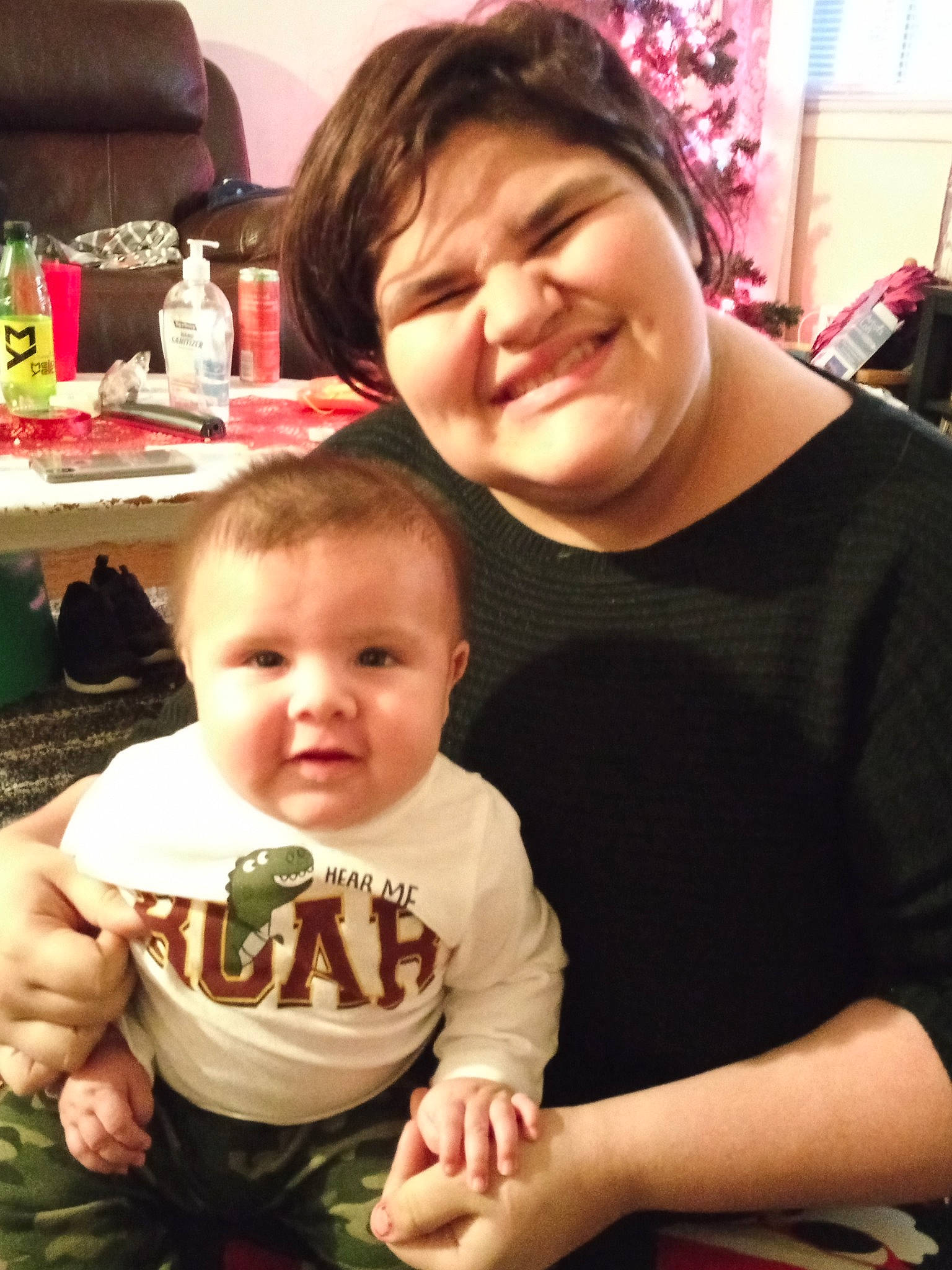 Cortez is registered to the contest to win money with this photo: arm, baby, baby_toddler_clothing, cheek, chin, face, facial_expression, fun, hair, hairstyle, happy, head, iris, joy, lap, mouth, person, skin, smile, snapshot