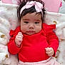 Jessica joined the competition — help win amazing prizes! baby, infant, child, bow, headband, pink, red_clothing, blanket, soft_toy, portrait, hands, eyes, cheeks, hair, cozy, sitting, bouncer_seat, cute, nursery, expression