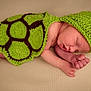 Clyde joined the competition — help win amazing prizes! baby, newborn, sleeping, crochet, hat, turtle_shell, green, infant, cute, resting, soft, blanket, skin, peaceful, hand, foot, portrait, cozy, closeup, child