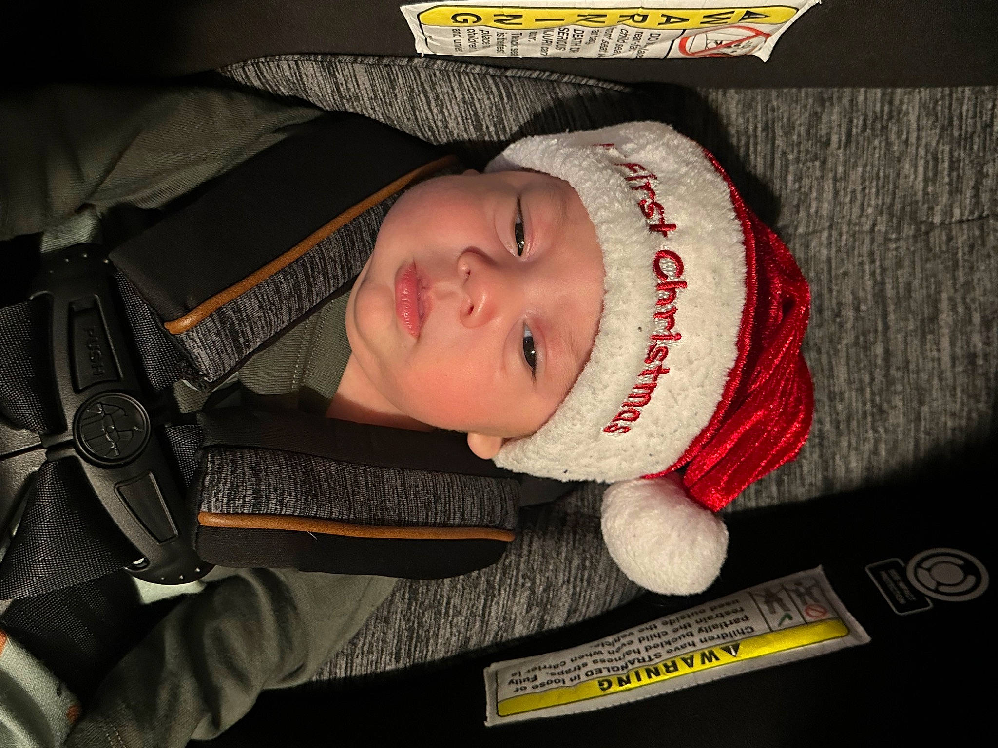 Romeo is registered to the contest to win money with this photo: baby, baby_carriage, baby_products, baby_sleeping, baby_toddler_clothing, beanie, cap, car_seat, carmine, child, comfort, costume_hat, fashion_accessory, font, glove, headwear, helmet, human_body, knit_cap, person