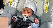 Zahari joined the competition — help win amazing prizes! baby, infant, car_seat, maxi_cosi, pacifier, hat, clothing, stripes, socks, seatbelt, child, safety, transport, newborn, cute, indoors, person, small, bundle, resting
