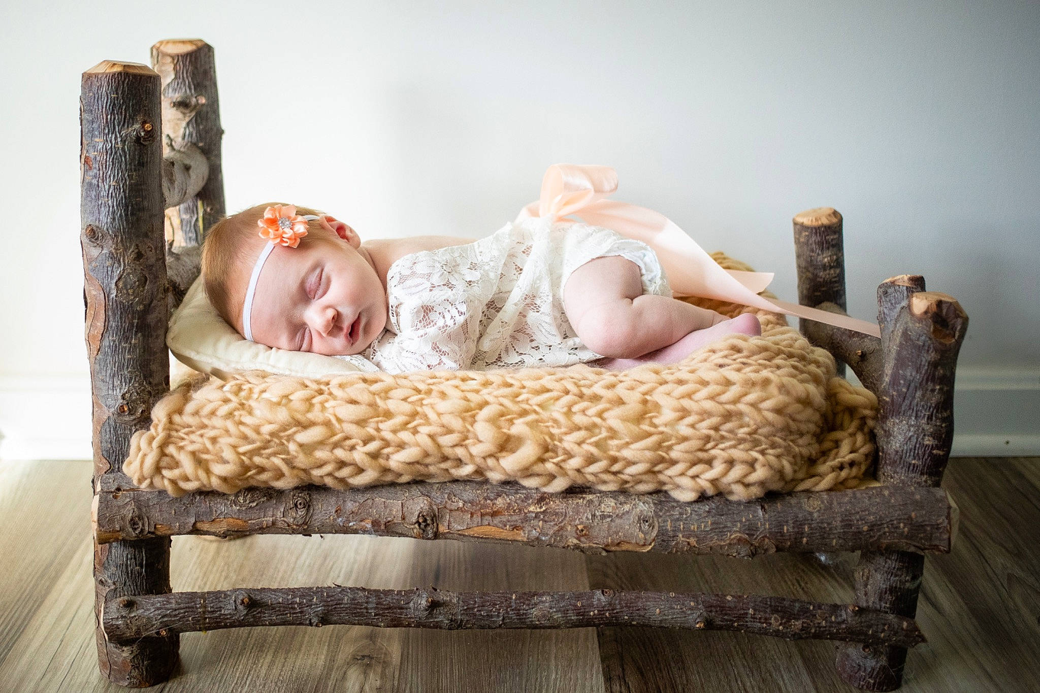 Brynlee is registered to the contest to win money with this photo: baby, child, comfort, event, flash_photography, flooring, fur, goggles, happy, hardwood, home_accessories, leisure, linens, natural_material, person, portrait_photography, room, sitting, wicker, wood