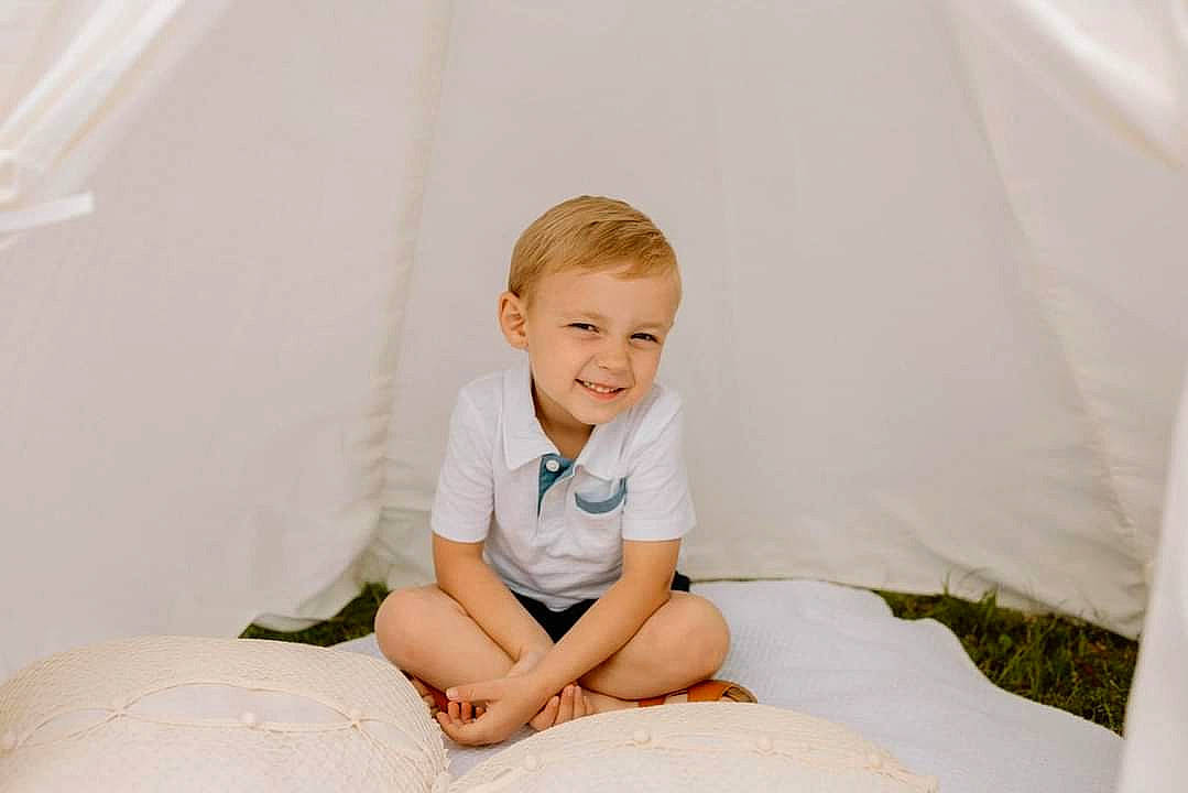 Kholton joined the competition — help win amazing prizes! baby, baby_toddler_clothing, child, comfort, flash_photography, flooring, fun, grass, happy, joy, knee, leisure, linens, person, room, shorts, sitting, sleeve, smile, t_shirt