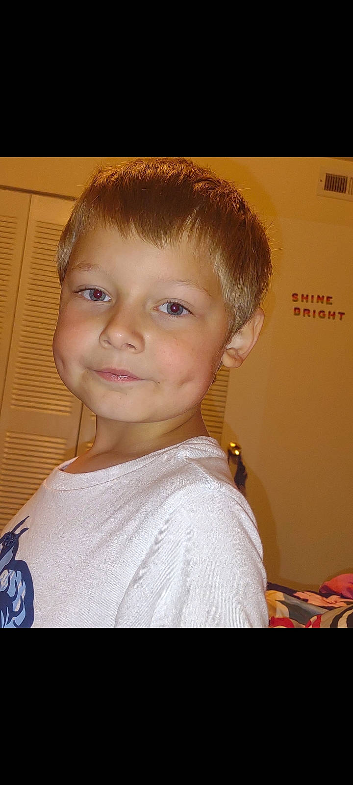 Brad is registered to the contest to win money with this photo: bangs, blond, brown_hair, cheek, child, chin, ear, eye, eyebrow, eyelash, face, forehead, happy, iris, jaw, joy, neck, nose, person, smile