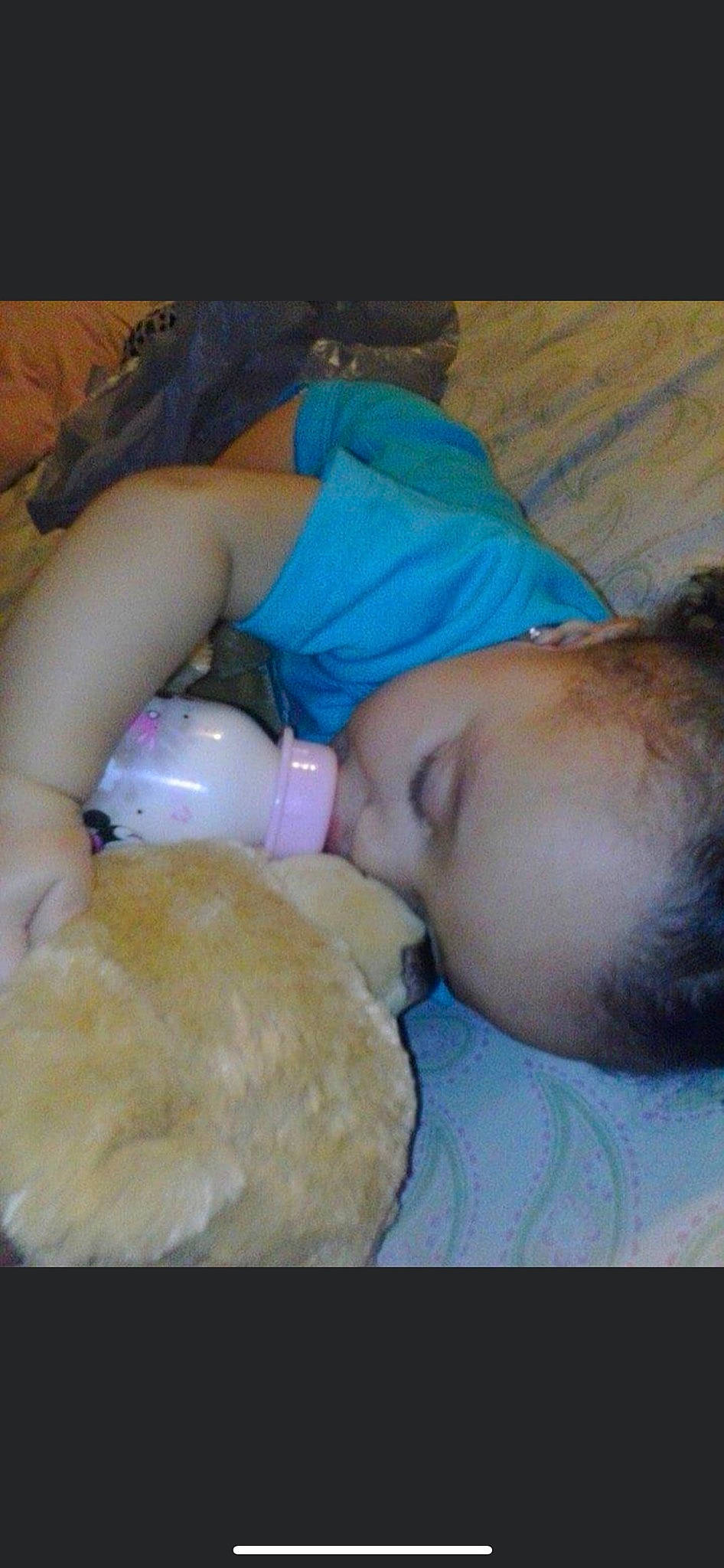 Leileanna is registered to the contest to win money with this photo: abdomen, baby, baby_products, baby_sleeping, baby_toddler_clothing, cheek, child, comfort, food, fur, nail, nap, nose, person, plush, skin, stuffed_toy, teddy_bear, textile, toddler