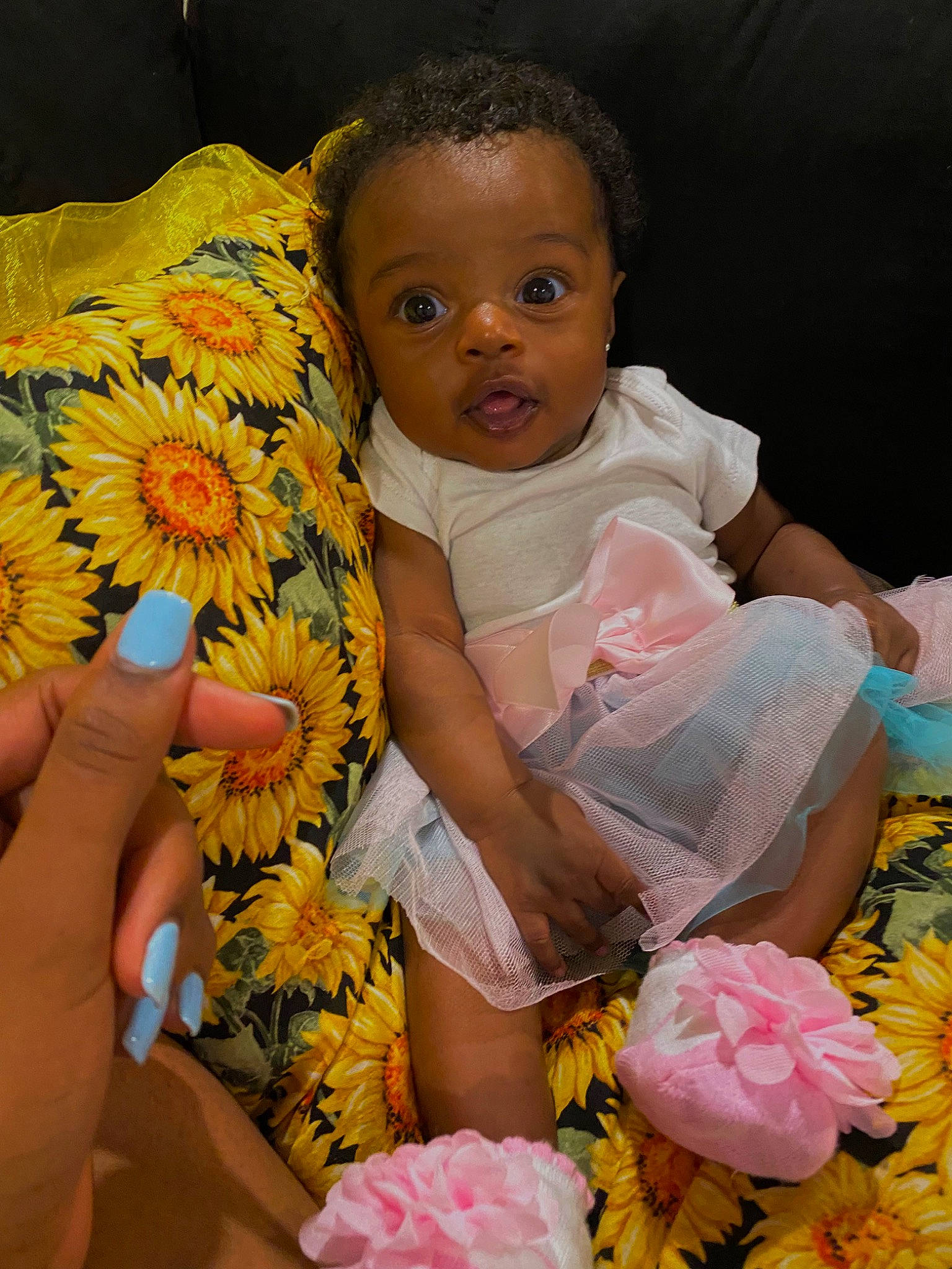 Blair is registered to the contest to win money with this photo: baby, baby_toddler_clothing, beauty, child, cut_flowers, event, finger, flower, fun, happy, nail, peach, people_in_nature, person, petal, pink, plant, skin, textile, toddler