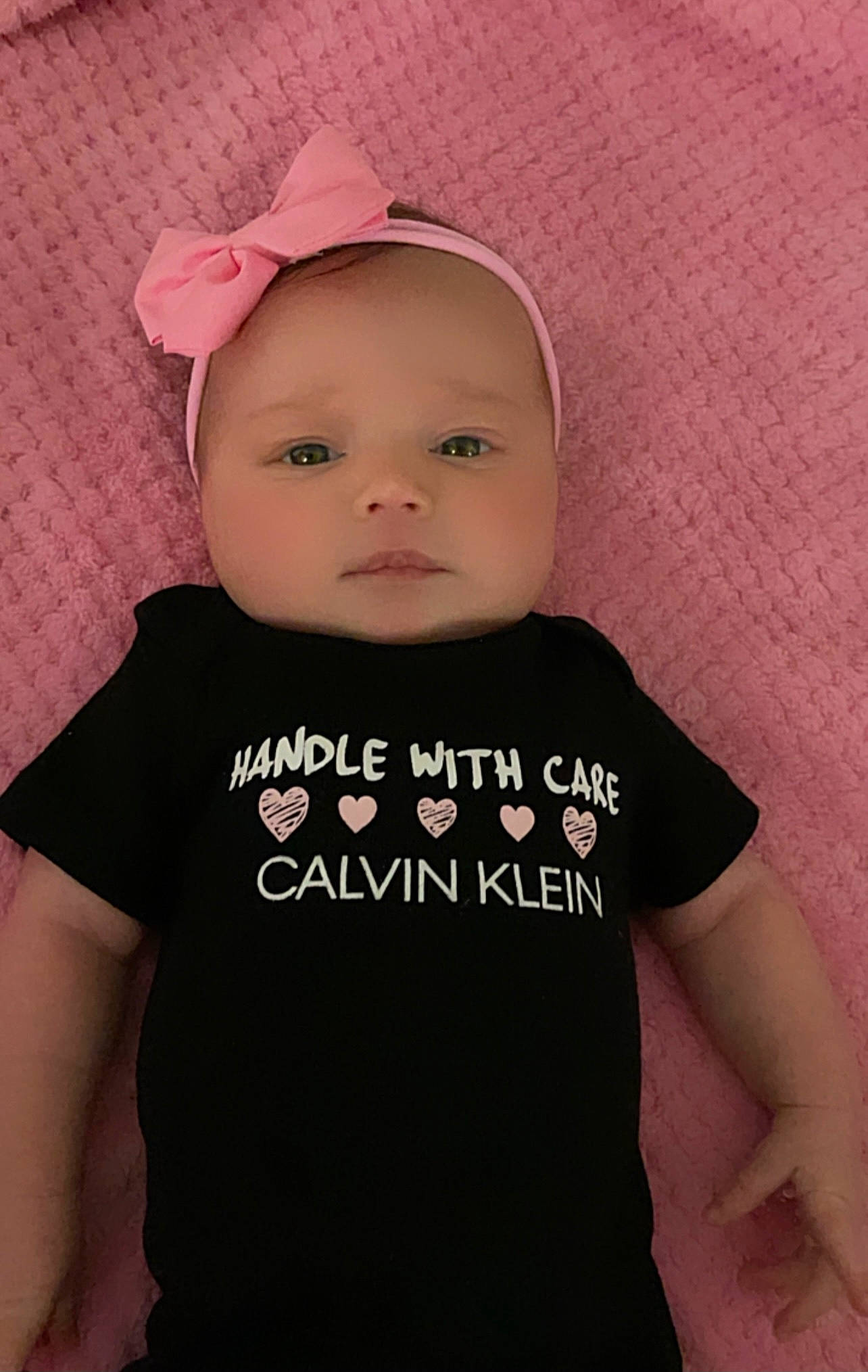 Adela joined the competition — help win amazing prizes! baby, baby_toddler_clothing, cap, cheek, child, cool, costume_hat, eyebrow, face, happy, head, lip, magenta, mammal, neck, person, pink, skin, sleeve, t_shirt