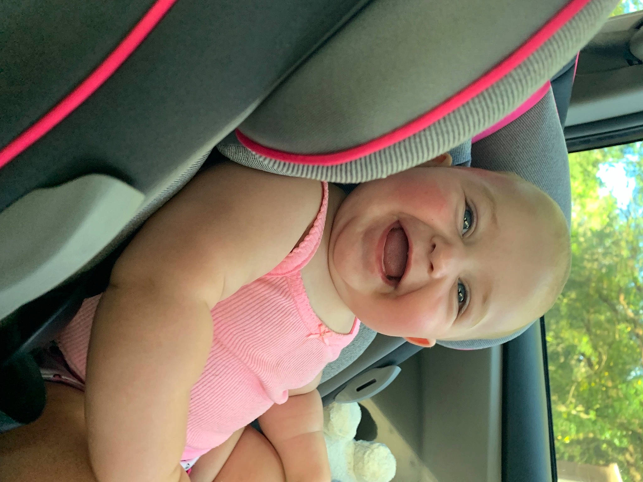 Kynzlee joined the competition — help win amazing prizes! auto_part, car_seat, chest, dress, eye, eyewear, grass, happy, headgear, leisure, lip, mouth, person, pink, plant, smile, thigh, toddler, tree, vehicle_door