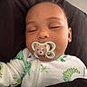 Isaiah joined the competition — help win amazing prizes! animal_print, baby, bedtime, blanket, caterpillar, child, closeup, comfort, cozy, cute, face, frog, head, indoors, infant, onesie, pacifier, peaceful, rest, sleeping