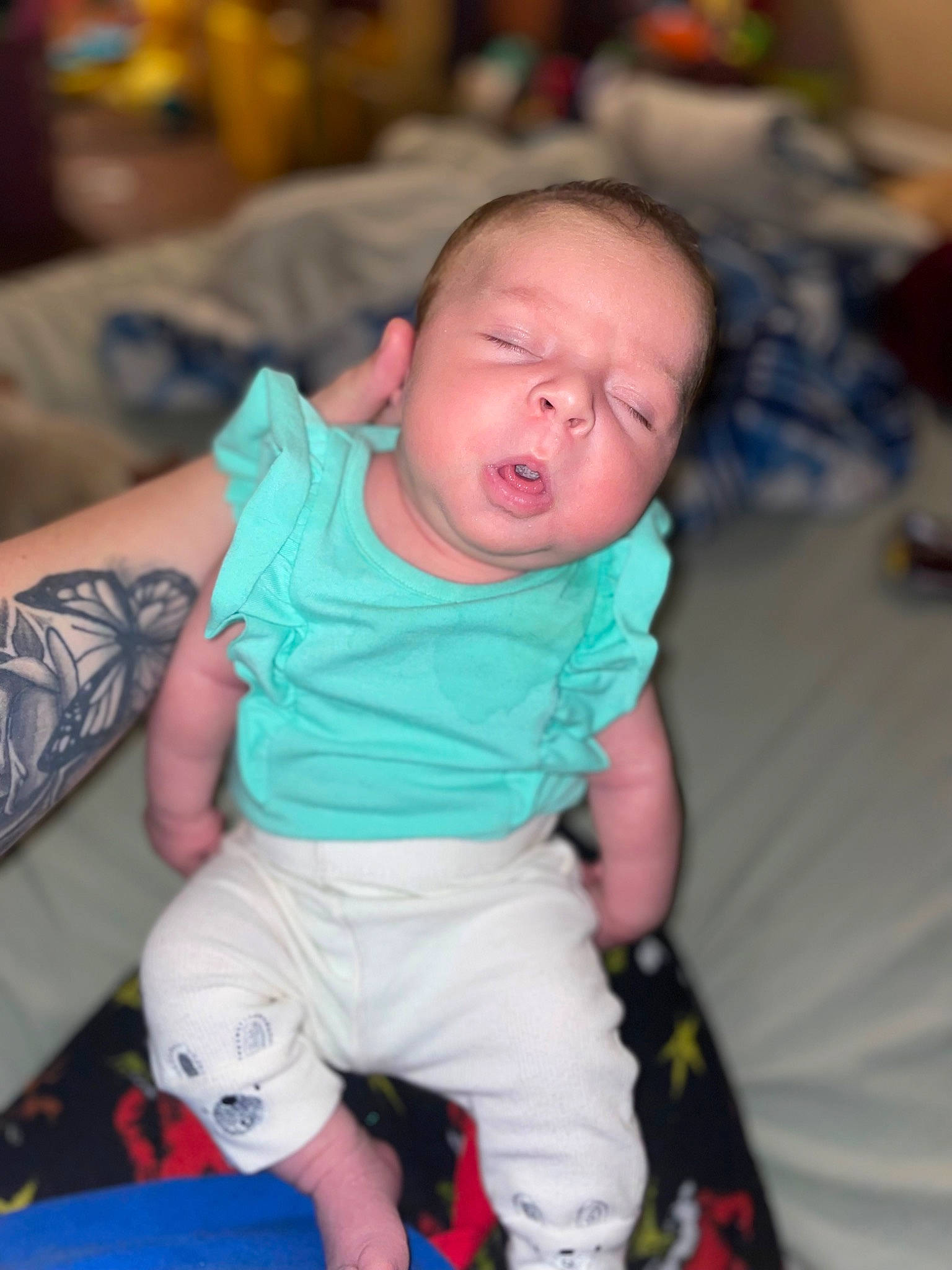 Maliyah is registered to the contest to win money with this photo: baby, baby_products, baby_toddler_clothing, cheek, child, comfort, event, facial_expression, flooring, fun, happy, joint, leisure, mouth, person, pink, play, room, sitting, skin