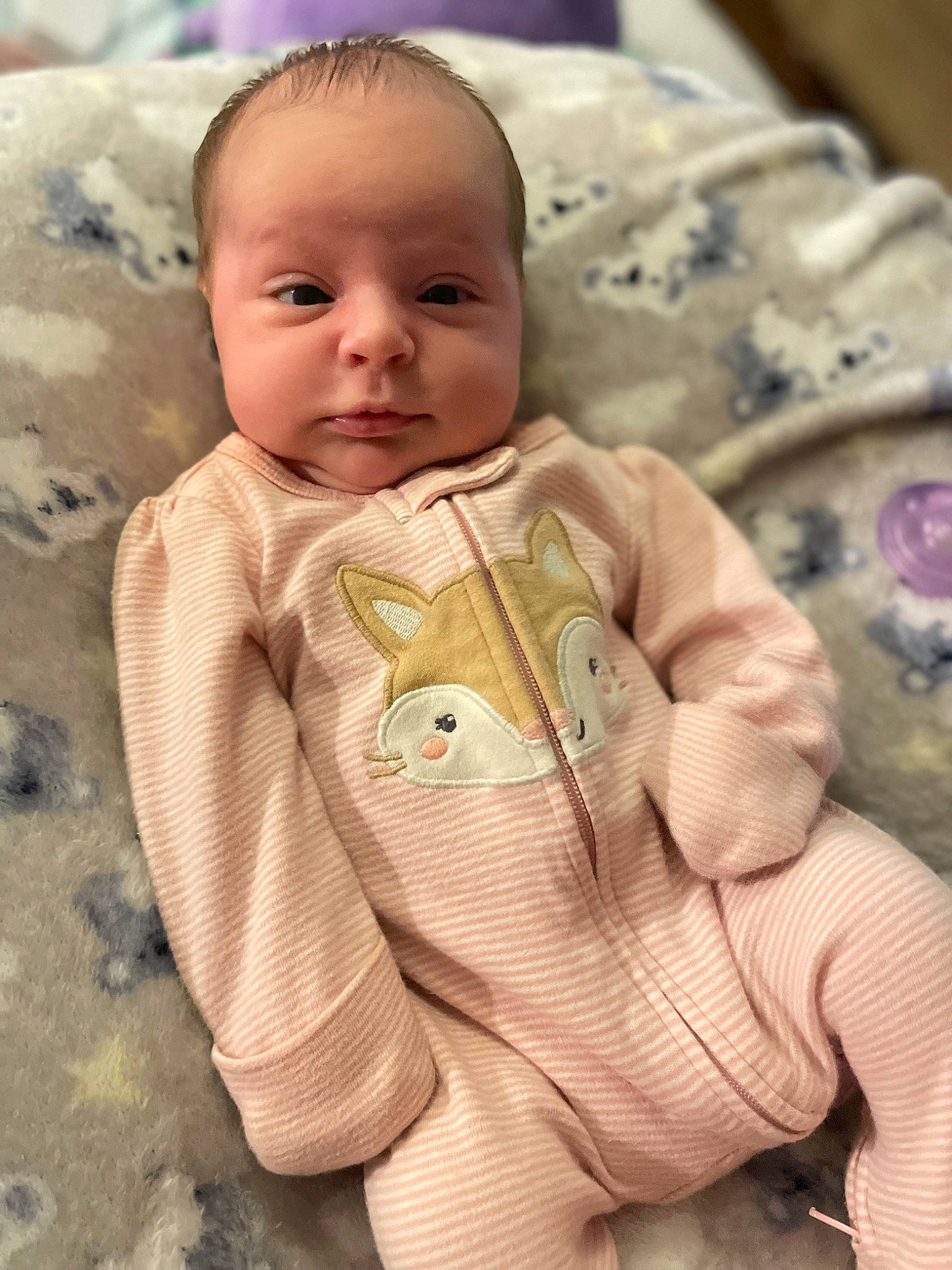 Maliyah is registered to the contest to win money with this photo: baby, baby_products, baby_toddler_clothing, cheek, child, comfort, finger, flooring, grass, happy, linens, nose, pattern, person, sitting, skin, sleeve, textile, thumb, toddler