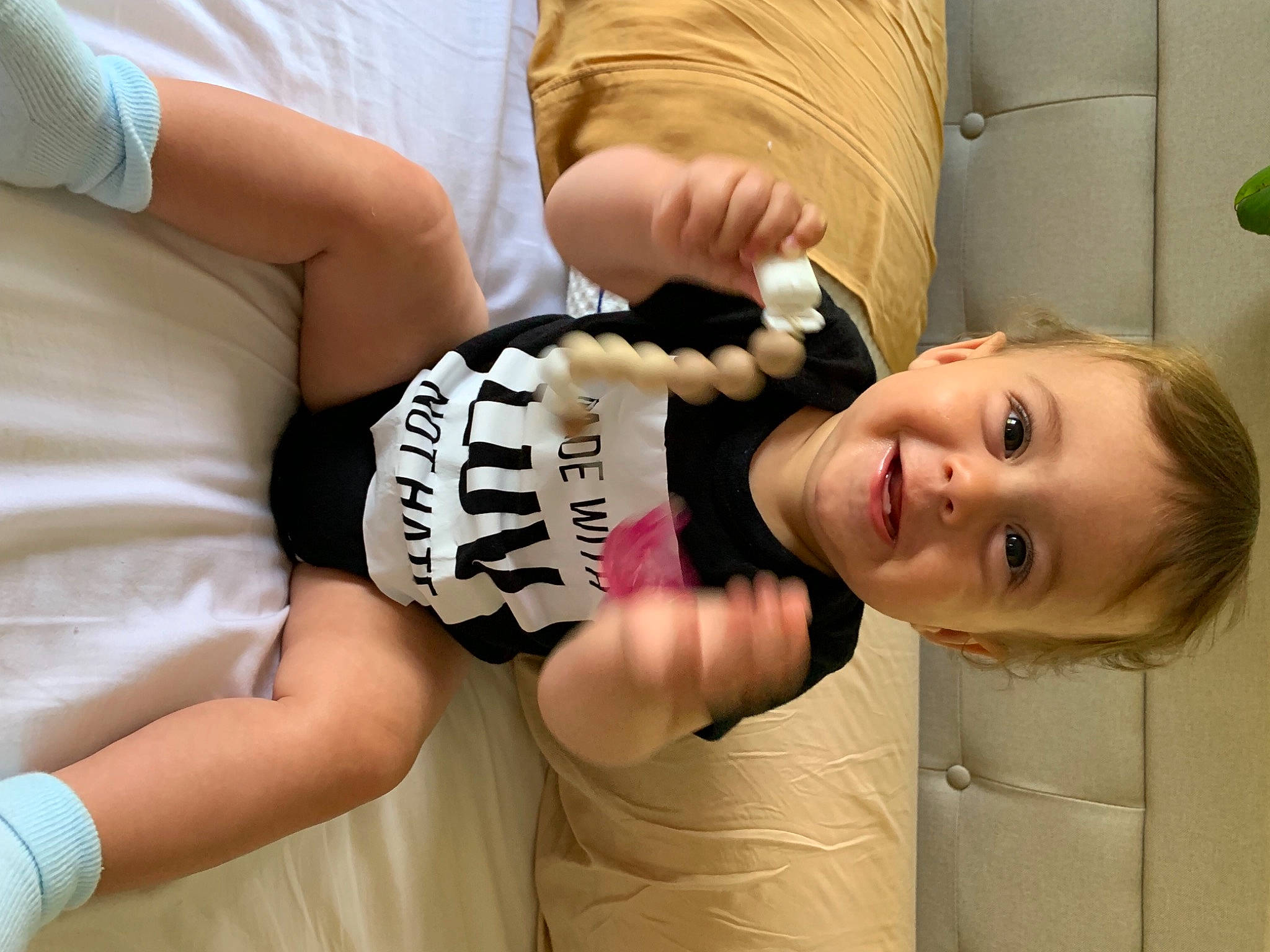 Sam joined the competition — help win amazing prizes! arm, baby_toddler_clothing, chest, comfort, elbow, eyelash, facial_expression, gesture, hairstyle, happy, joint, joy, knee, mouth, person, sleeve, smile, t_shirt, thigh, toddler