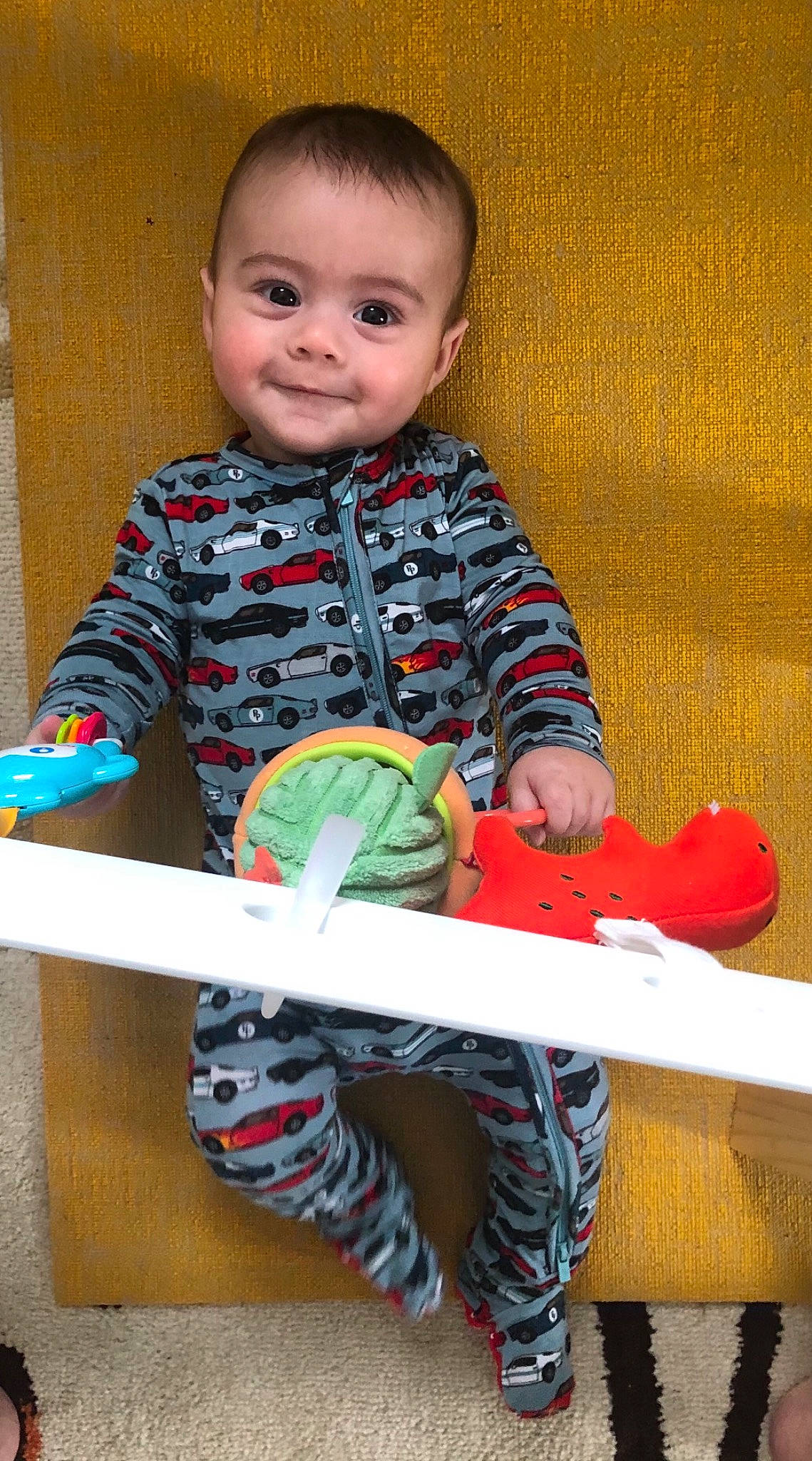 Sam joined the competition — help win amazing prizes! baby, baby_playing_with_toys, baby_products, baby_toddler_clothing, baby_toys, carmine, child, collar, face, happy, joy, pattern, person, play, room, sitting, sleeve, smile, t_shirt, toddler