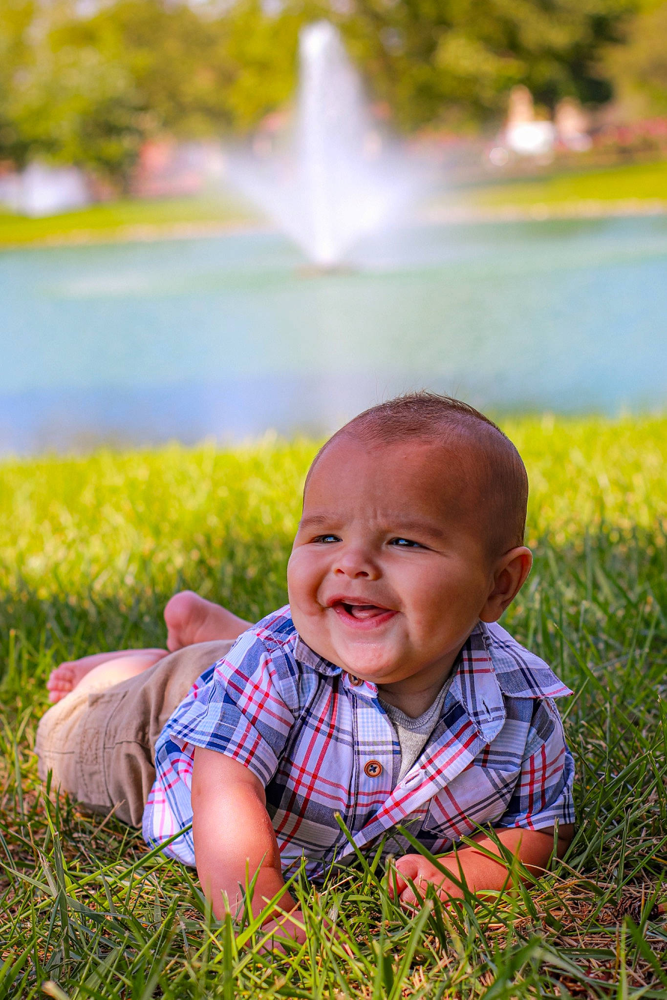 Clayton joined the competition — help win amazing prizes! baby, botany, daytime, flash_photography, fountain, grass, green, happy, joy, leaf, light, nature, people_in_nature, person, photograph, plant, skin, smile, standing, sunlight