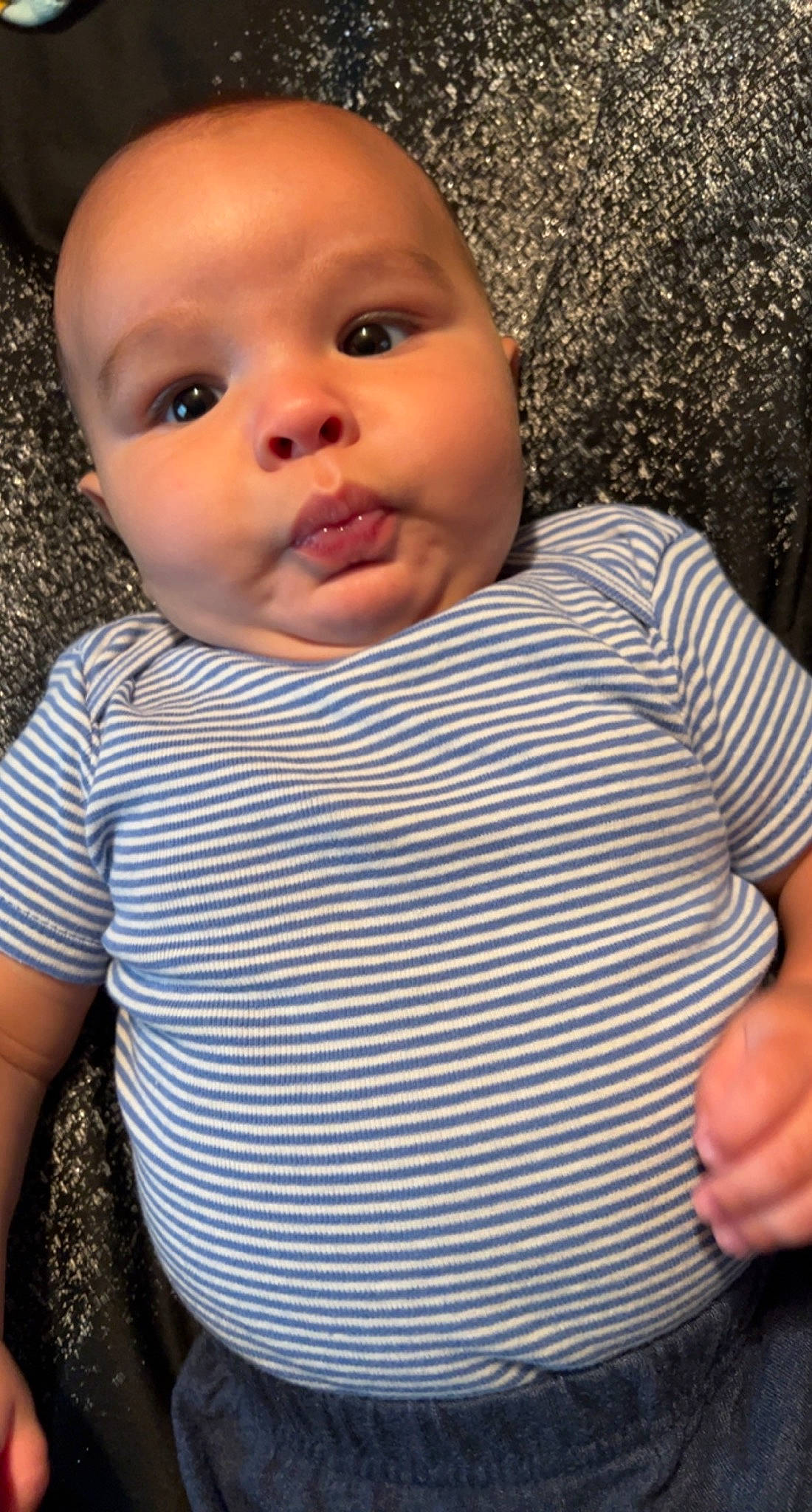 Clayton is registered to the contest to win money with this photo: baby, baby_toddler_clothing, cheek, child, chin, collar, comfort, eye, eyelash, gesture, happy, iris, lip, nose, pattern, person, portrait_photography, skin, sleeve, t_shirt
